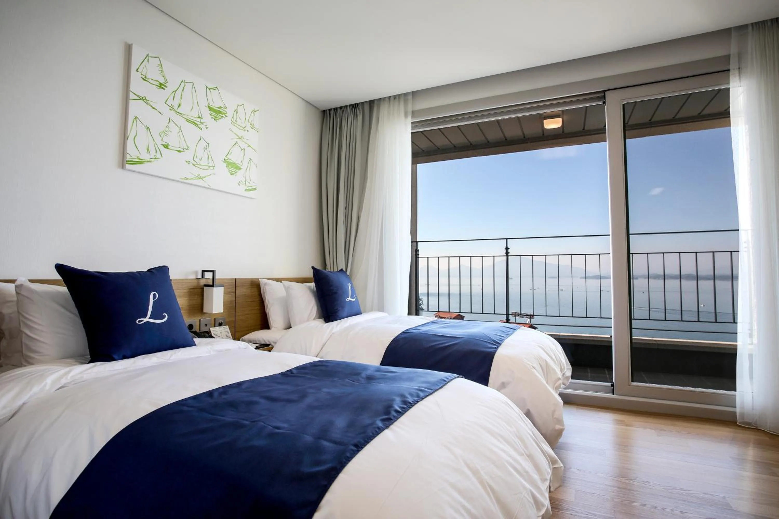 Balcony/Terrace, Bed in Lapis Hotel Namhae
