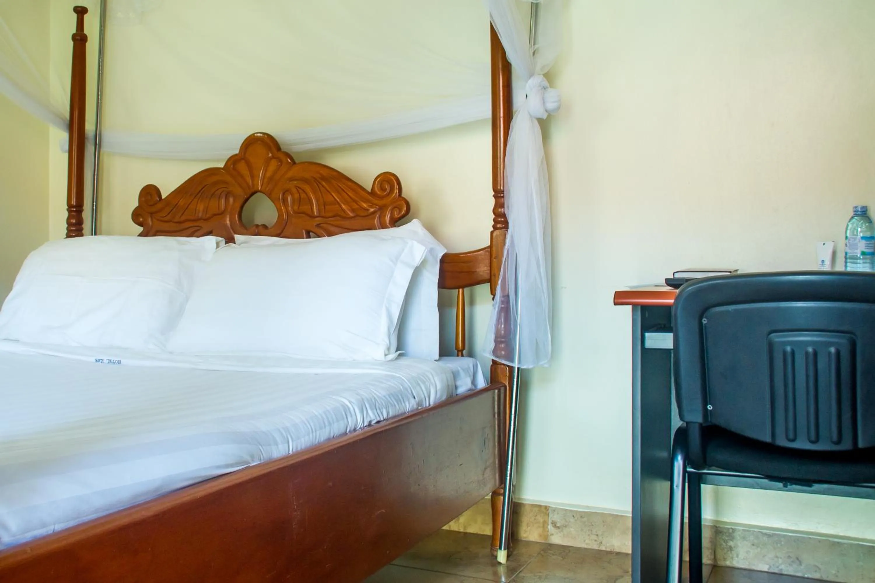 Bed in Sandton Hotel Kasese