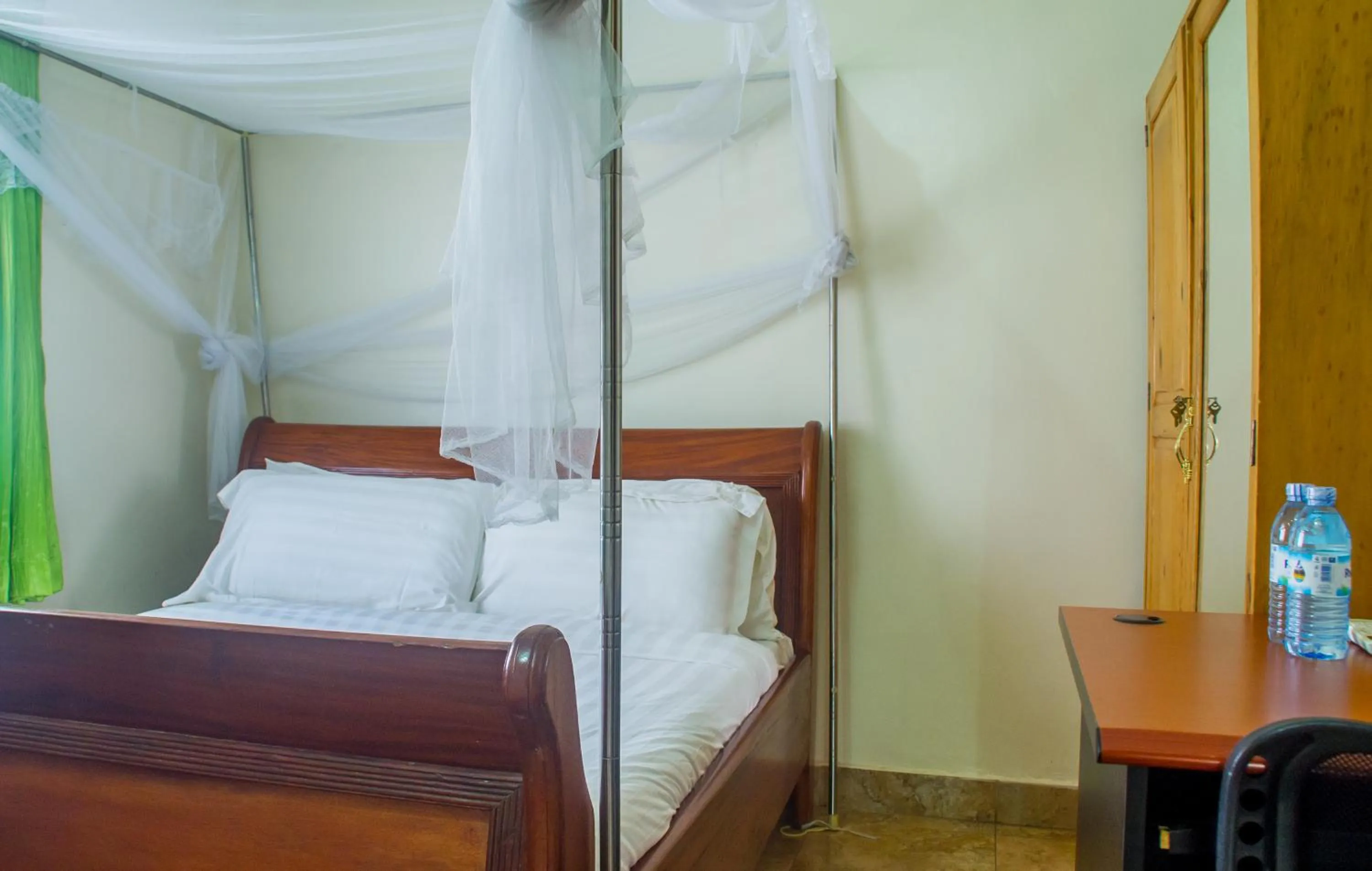 Photo of the whole room, Bed in Sandton Hotel Kasese