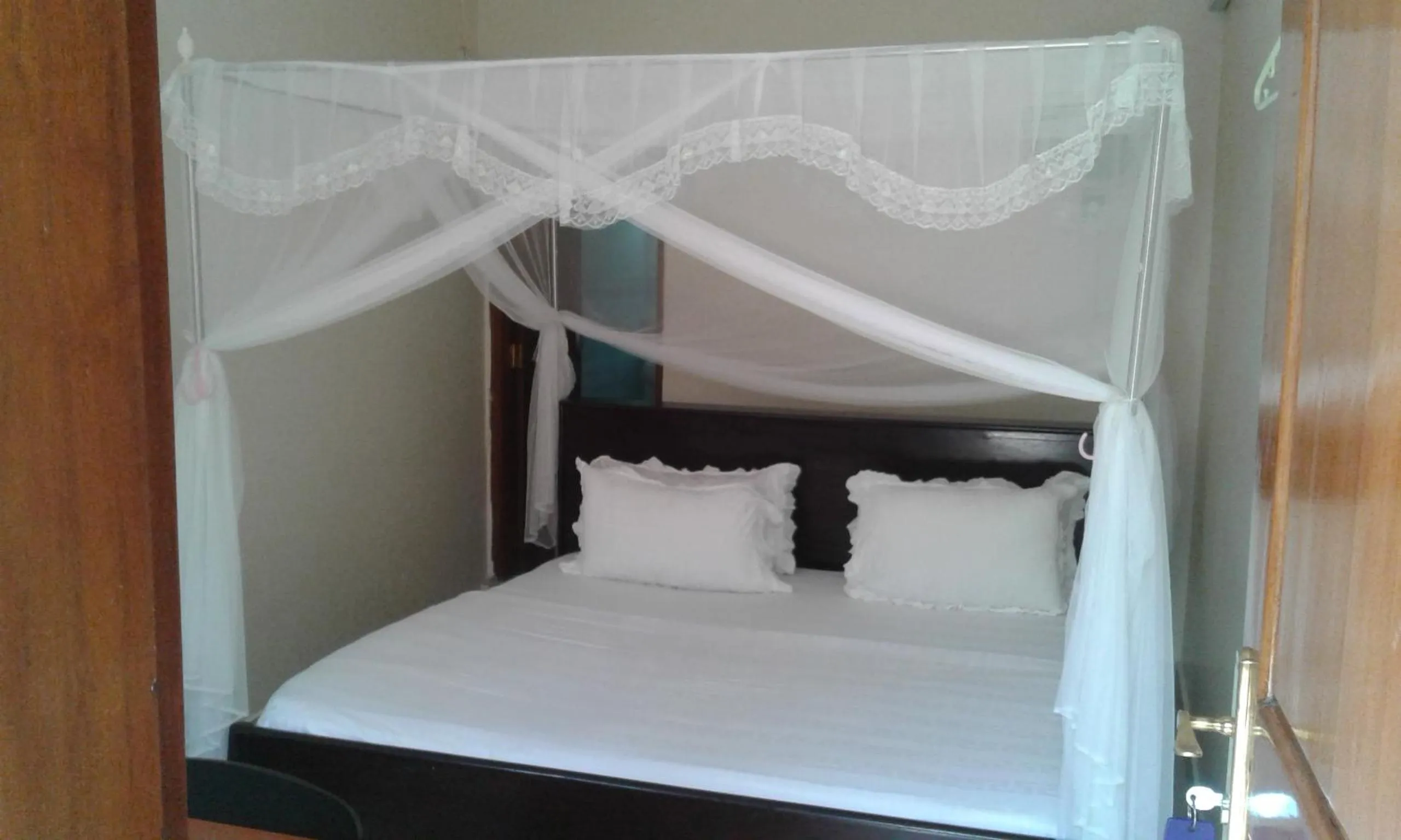 Bed in Sandton Hotel Kasese