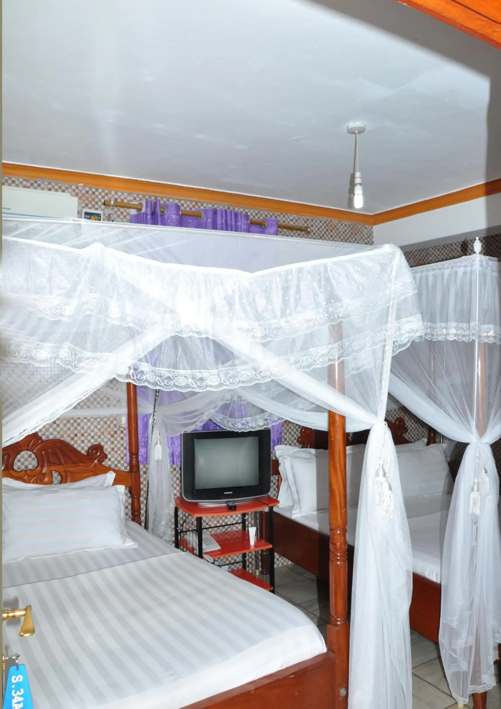 Deluxe Twin Room in Sandton Hotel Kasese Deluxe Twin Room in Sandton Hotel Kasese