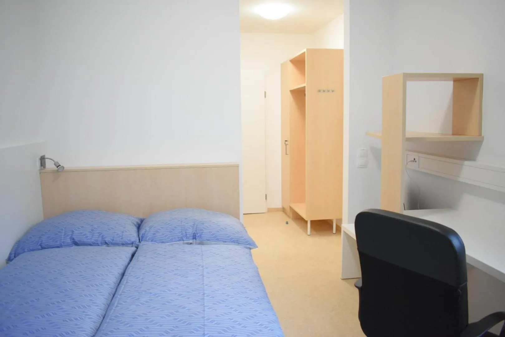 Bed in SOVEA Hotel - City