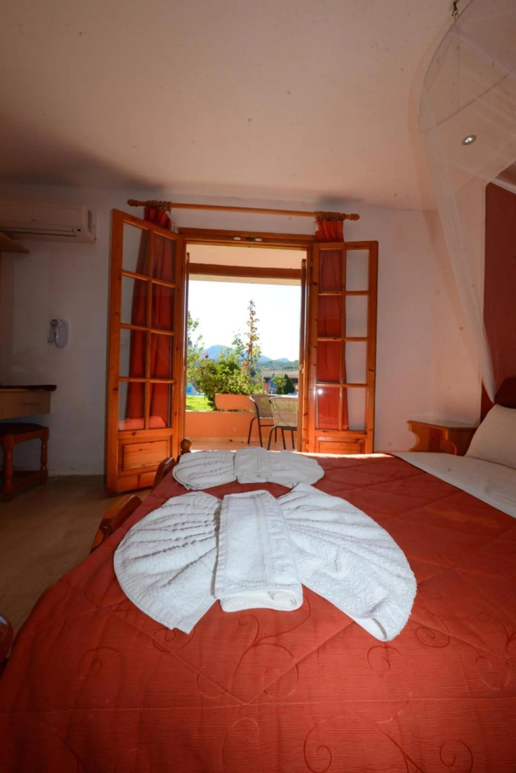 Property building, Bed in Charlies Venus Apartments