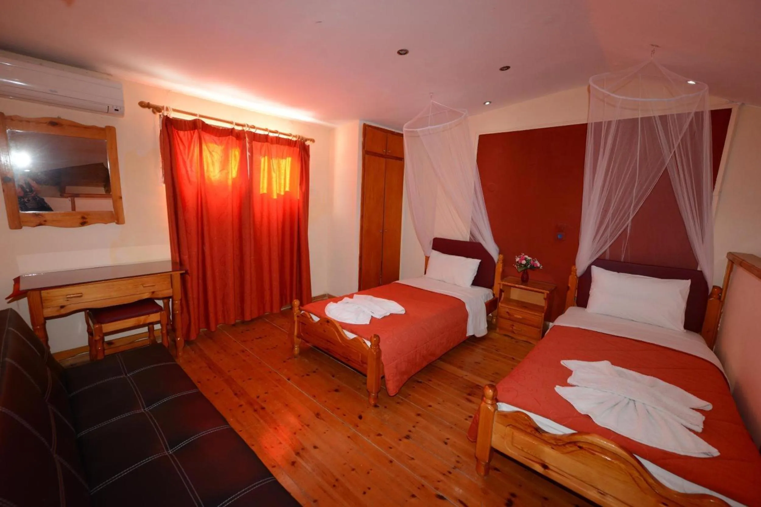 Property building, Bed in Charlies Venus Apartments