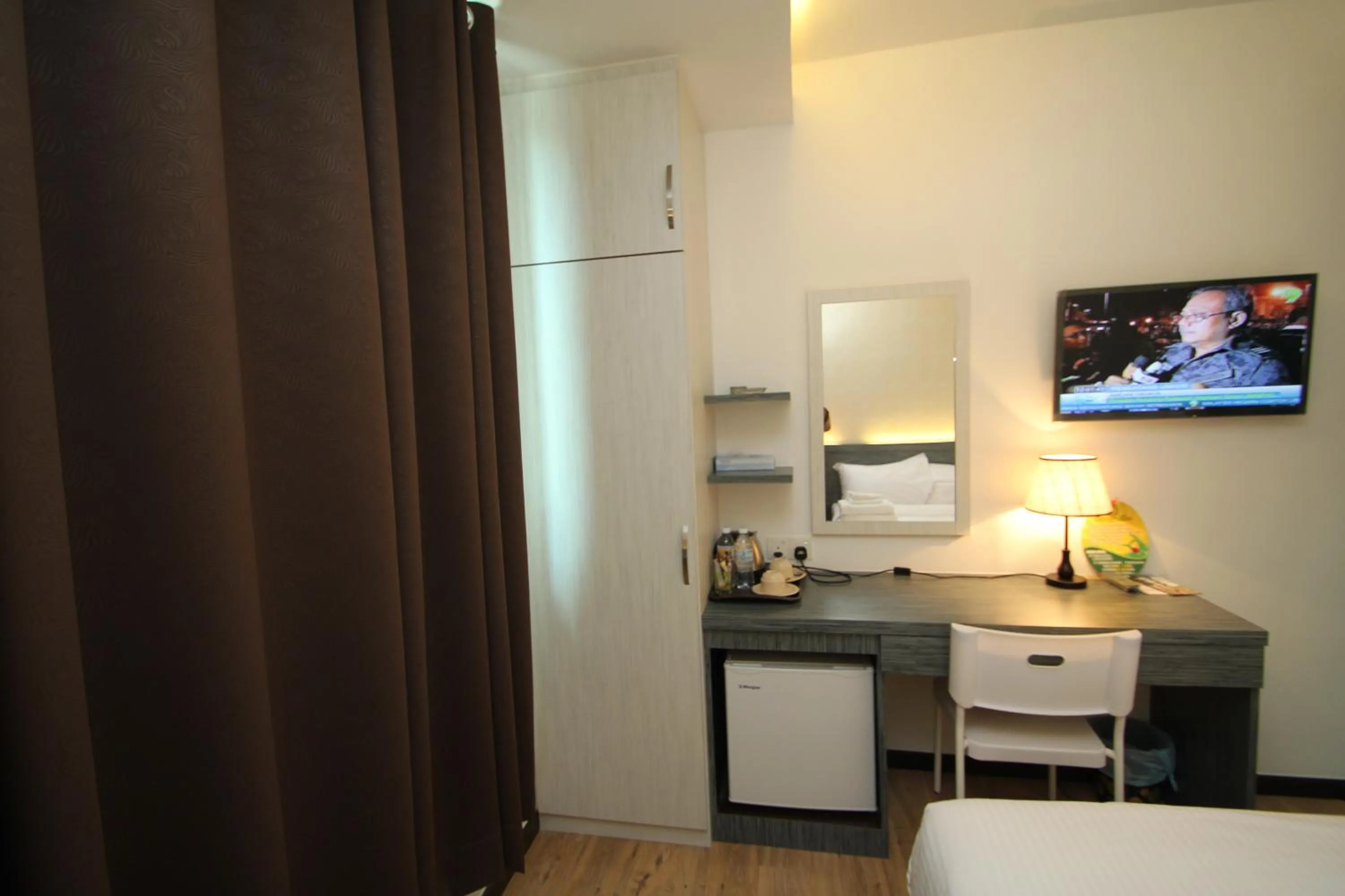 Bedroom in Century Inn Hotel