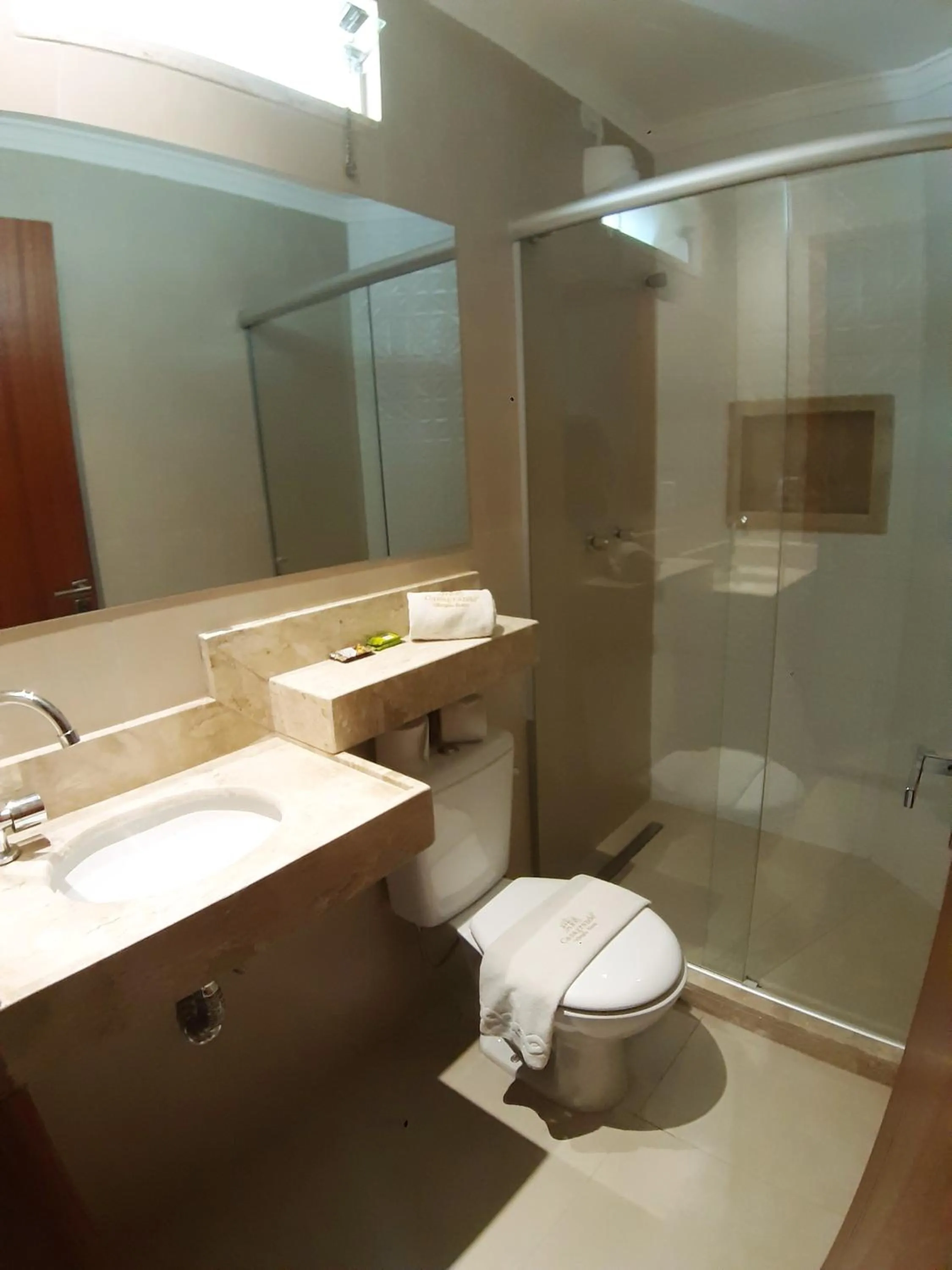 Bathroom in Casagrande Olímpia Hotel