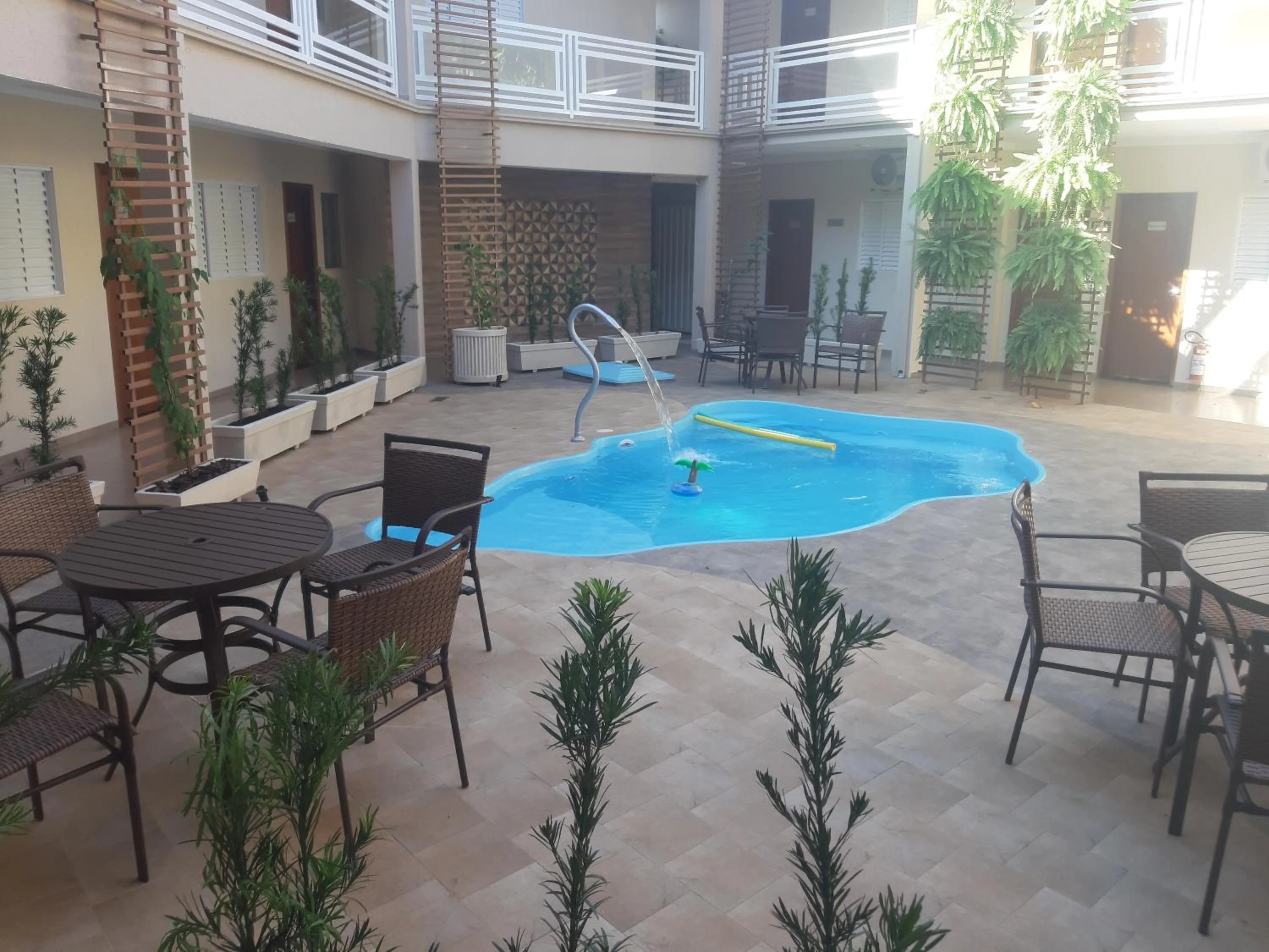 Swimming pool in Casagrande Olímpia Hotel