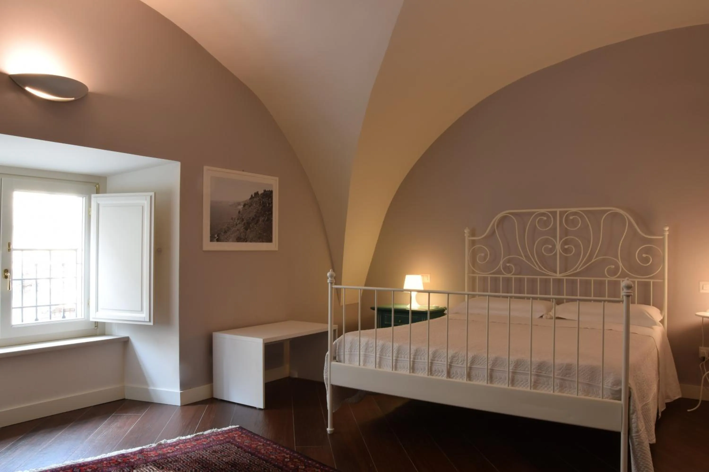 Photo of the whole room, Bed in Residenza Cavour