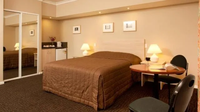 Bed in Motel Le Grande