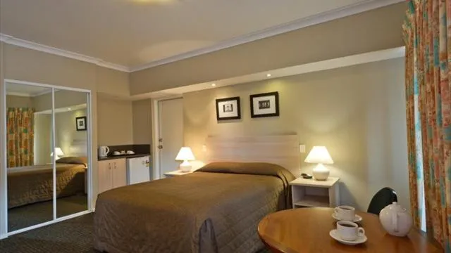 Bed in Motel Le Grande