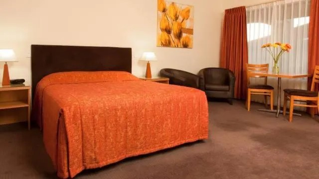 Bed in Motel Le Grande