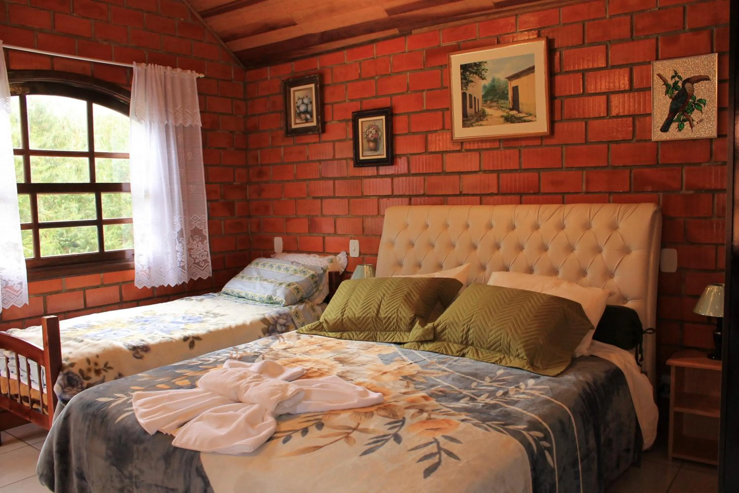 Bed in Emy Pousada