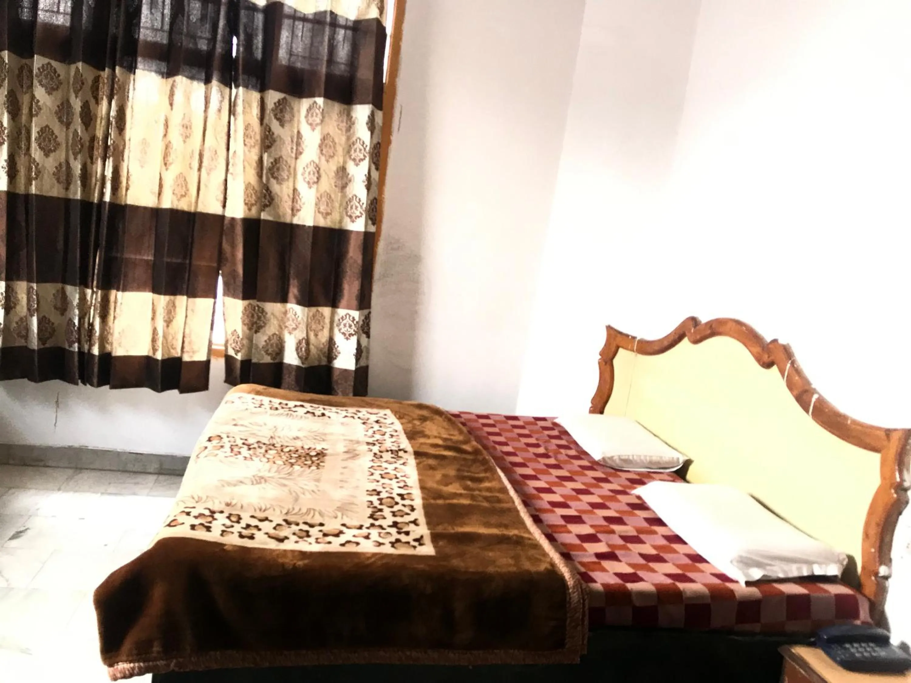 Bed in Hotel Kanshi Vishwa Nath