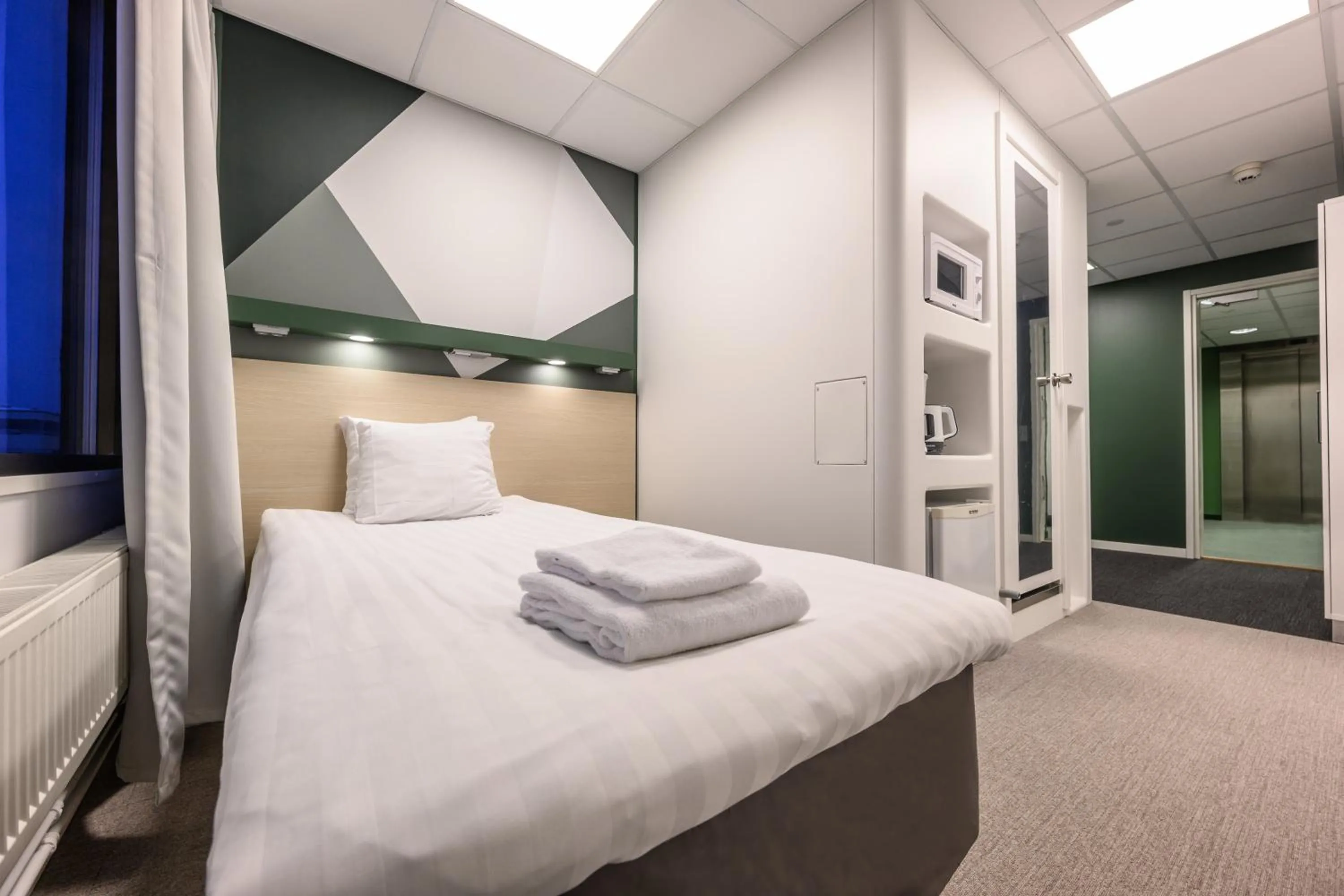 Bed in GreenStar Hotel Oulu