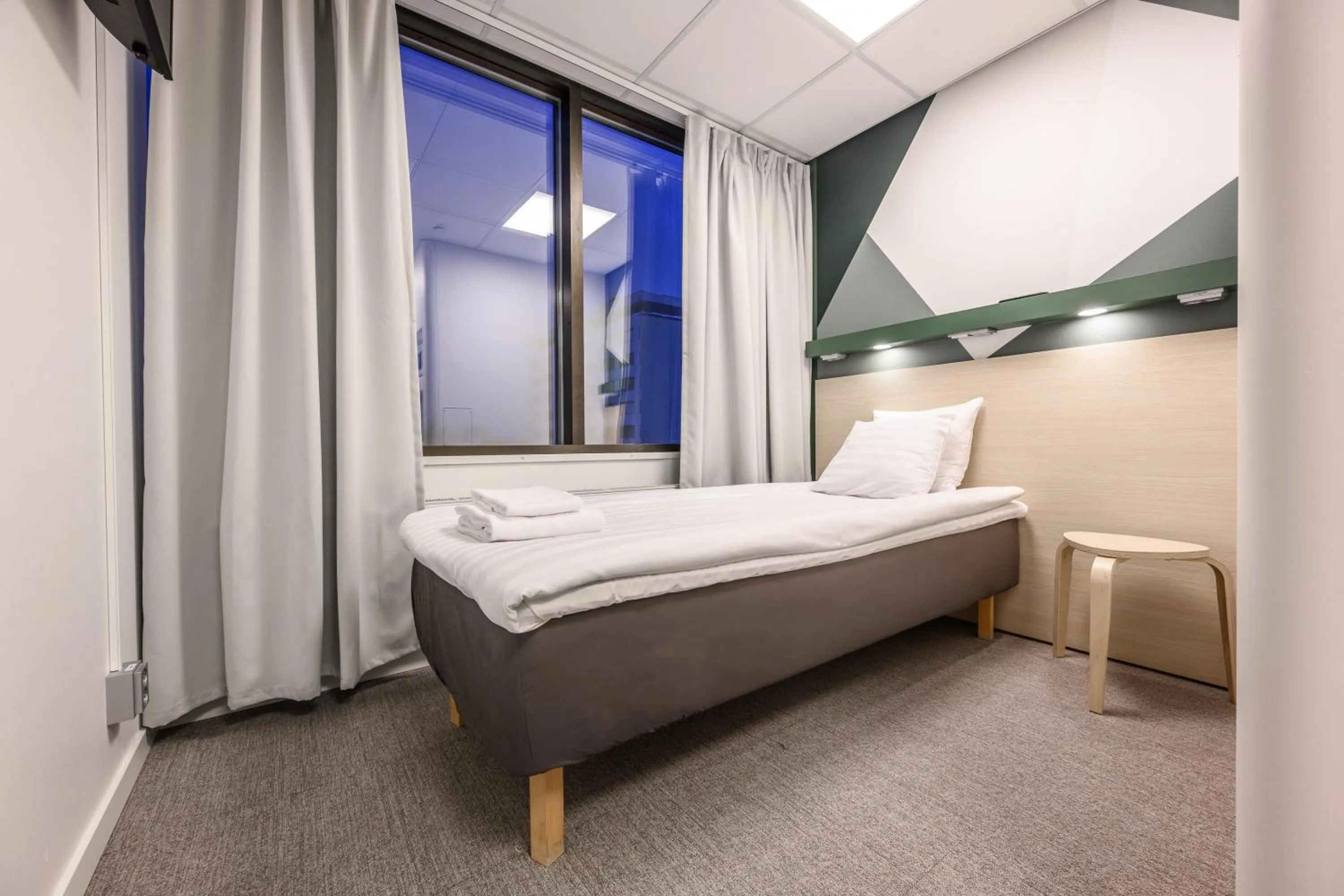 Bed in GreenStar Hotel Oulu