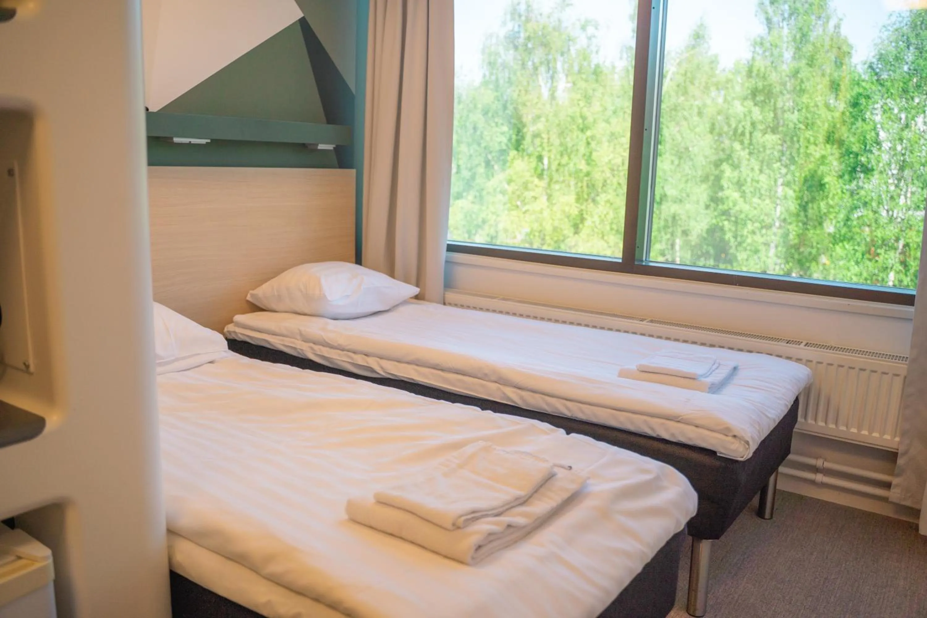 Bed in GreenStar Hotel Oulu