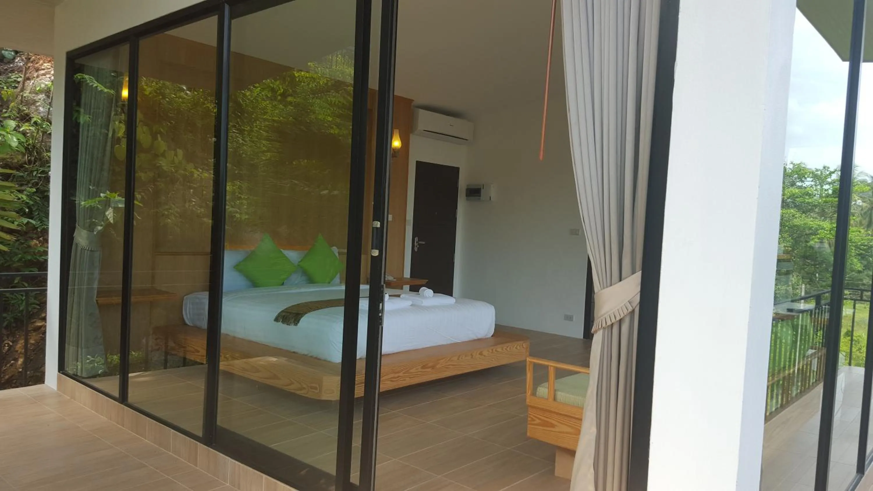 Photo of the whole room, Bed in Jasmine Resort And Spa