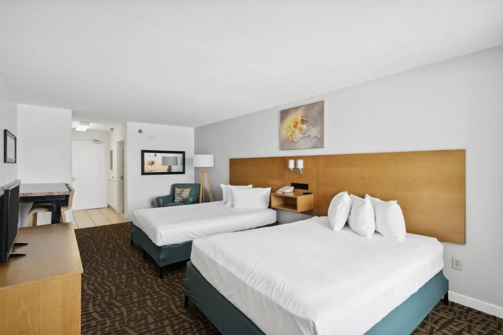 Bed in Beach Tower Beachfront Hotel, a By The Sea Resort