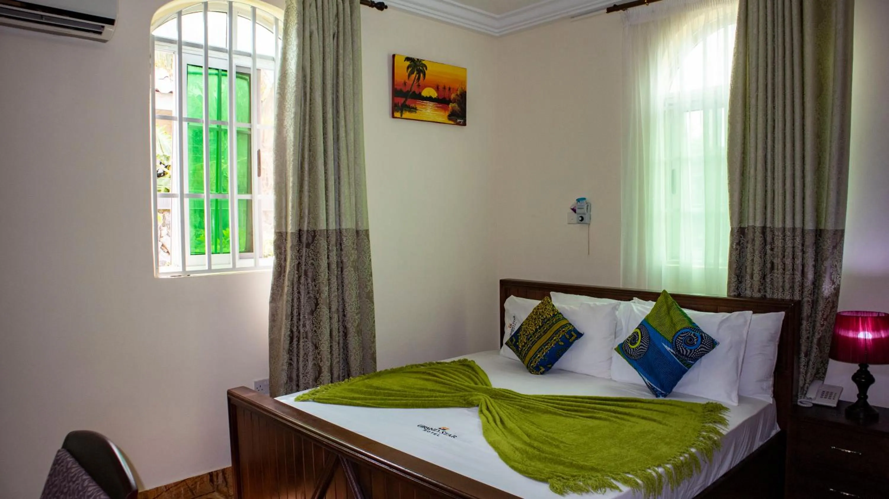 Bed in Grand Star Hotel