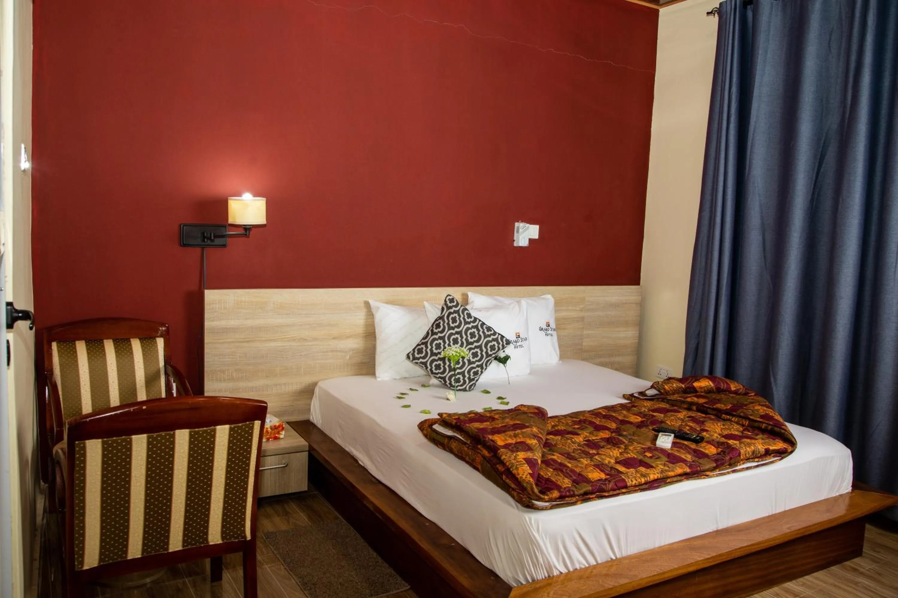 Bed in Grand Star Hotel