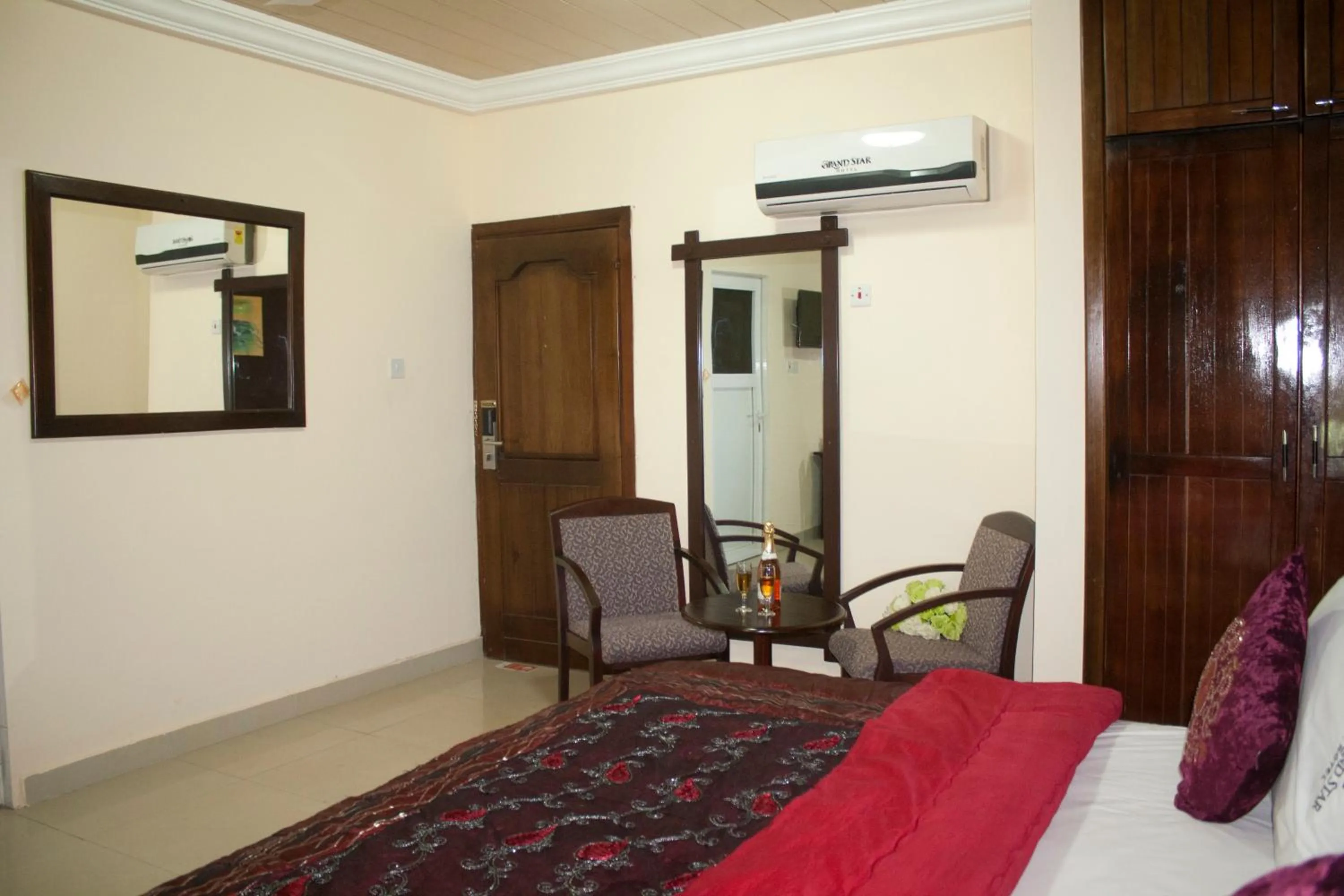 Bed in Grand Star Hotel