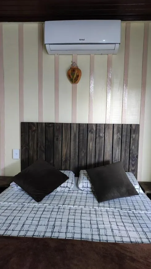 Bed in Pousada Recanto das Cores