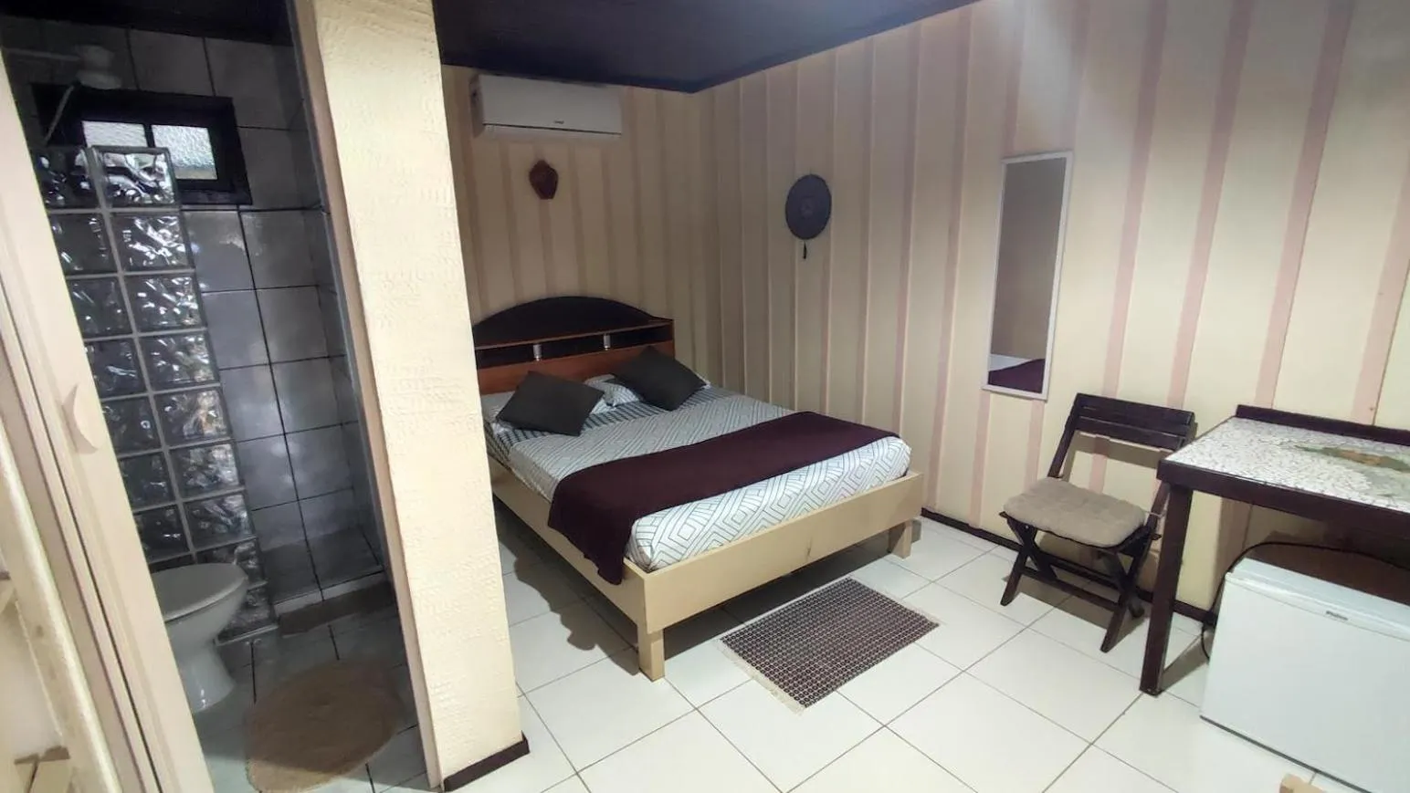 Bed in Pousada Recanto das Cores