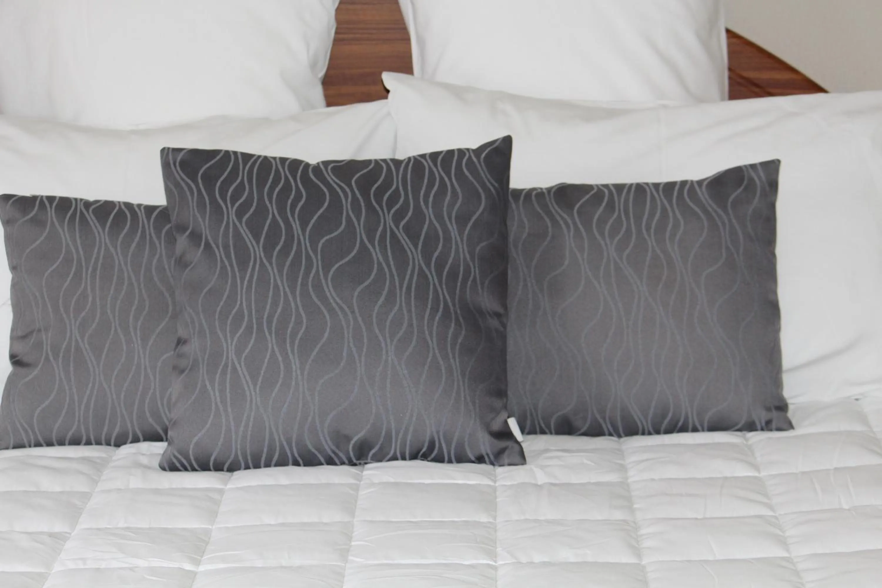 Bed in Coromandel Cottages