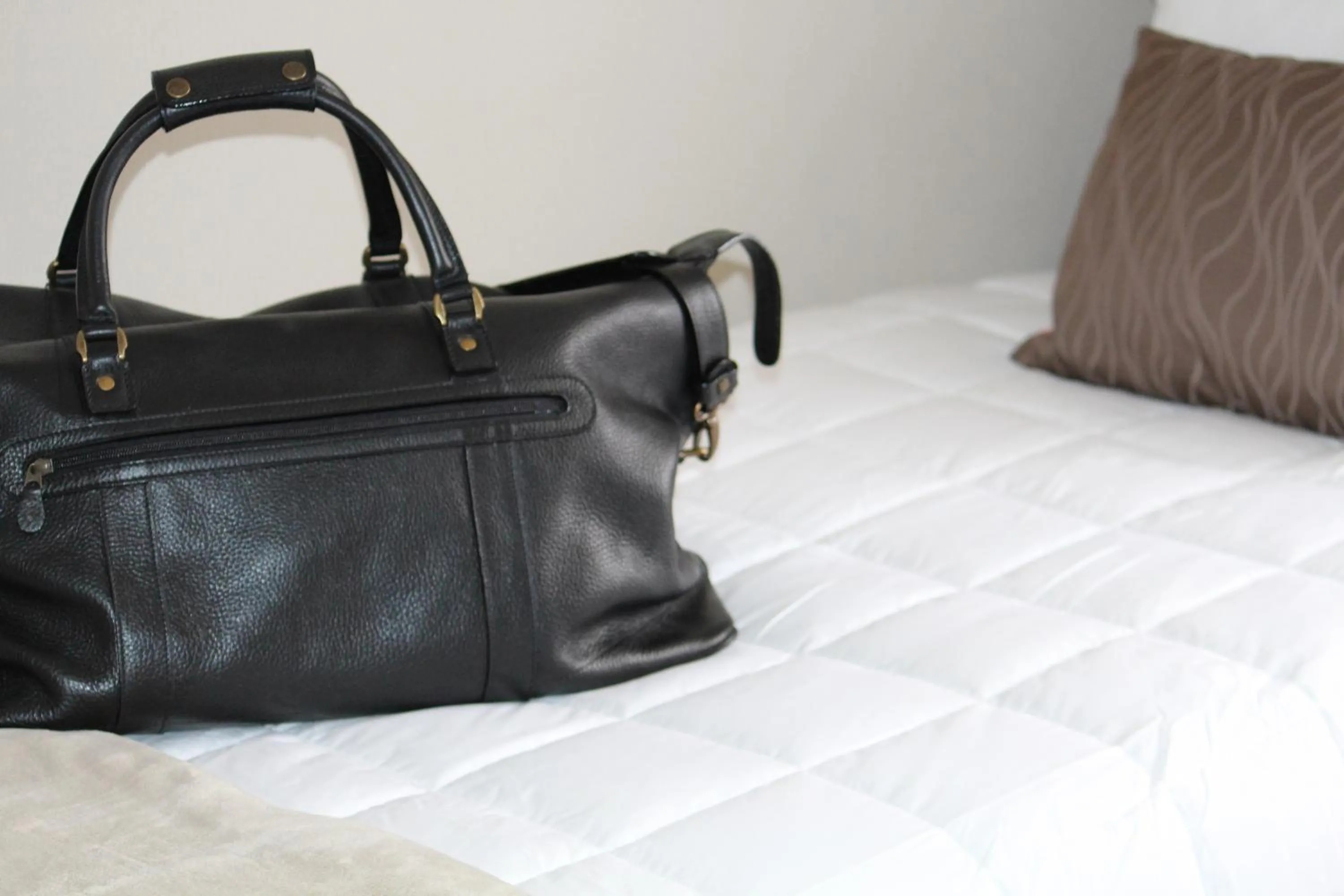 Bed in Coromandel Cottages