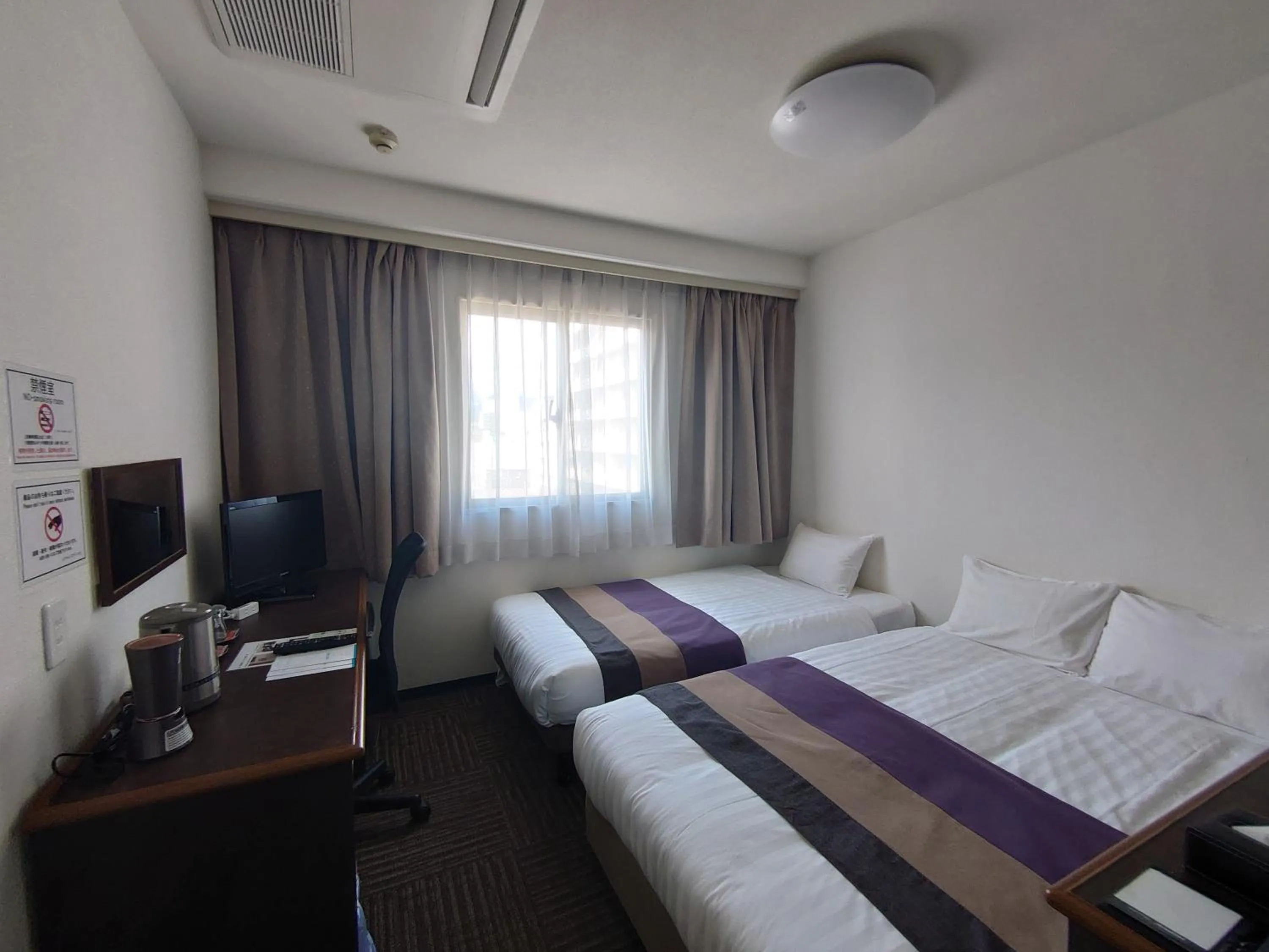 Bed in Hotel Area One Oita