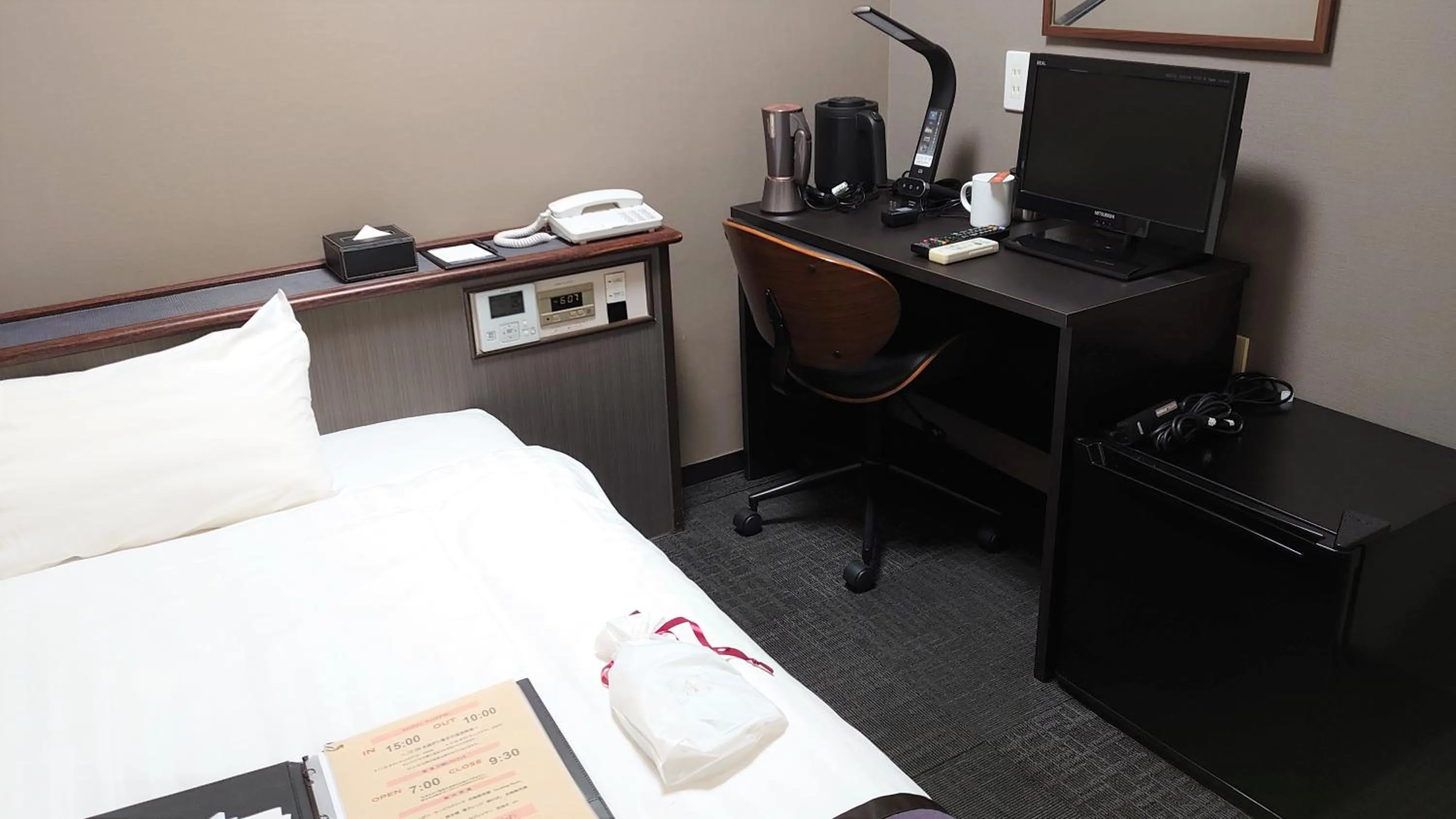 Bed in Hotel Area One Oita