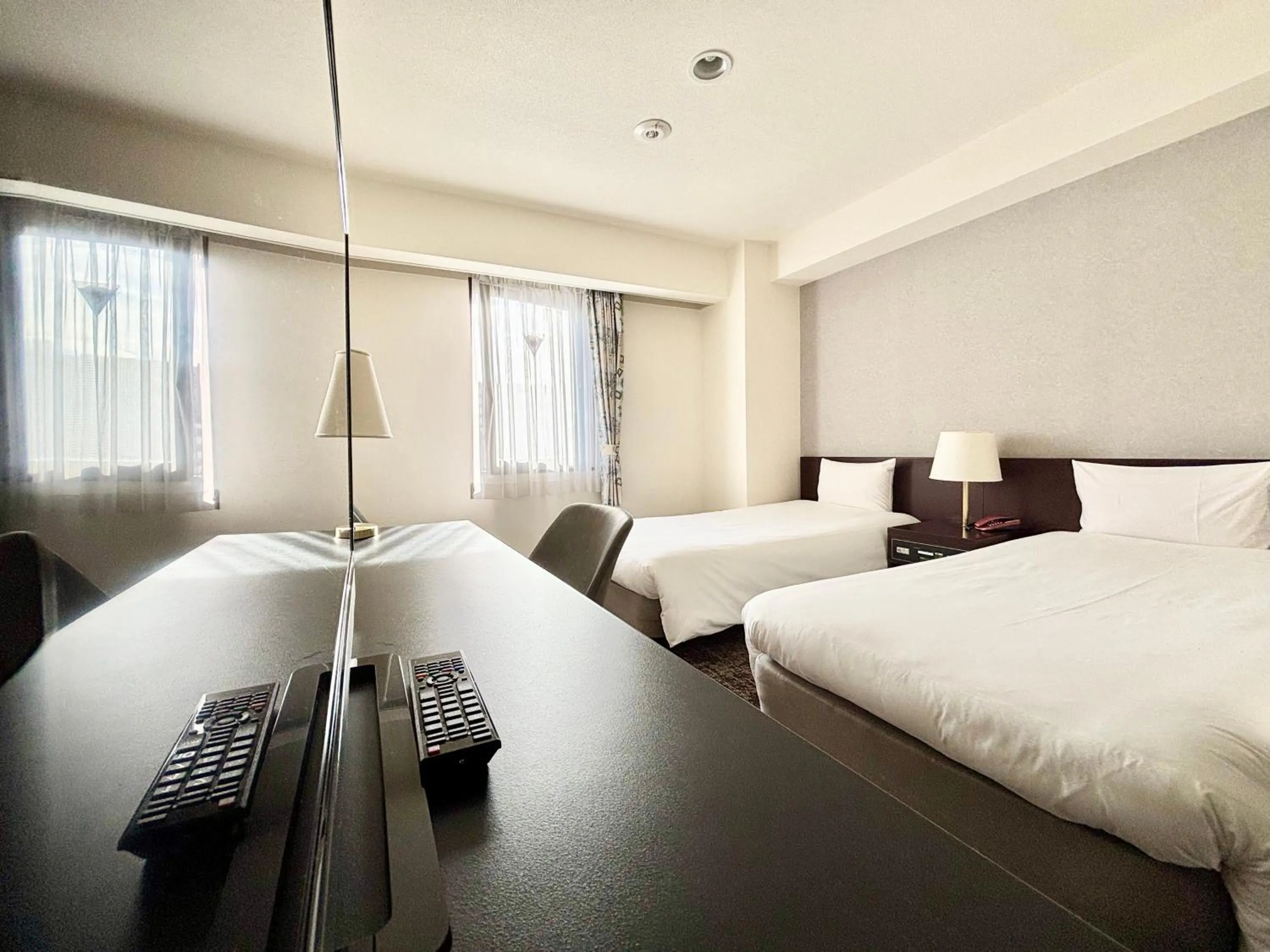 Bed in Hotel Bougain Villea Sapporo