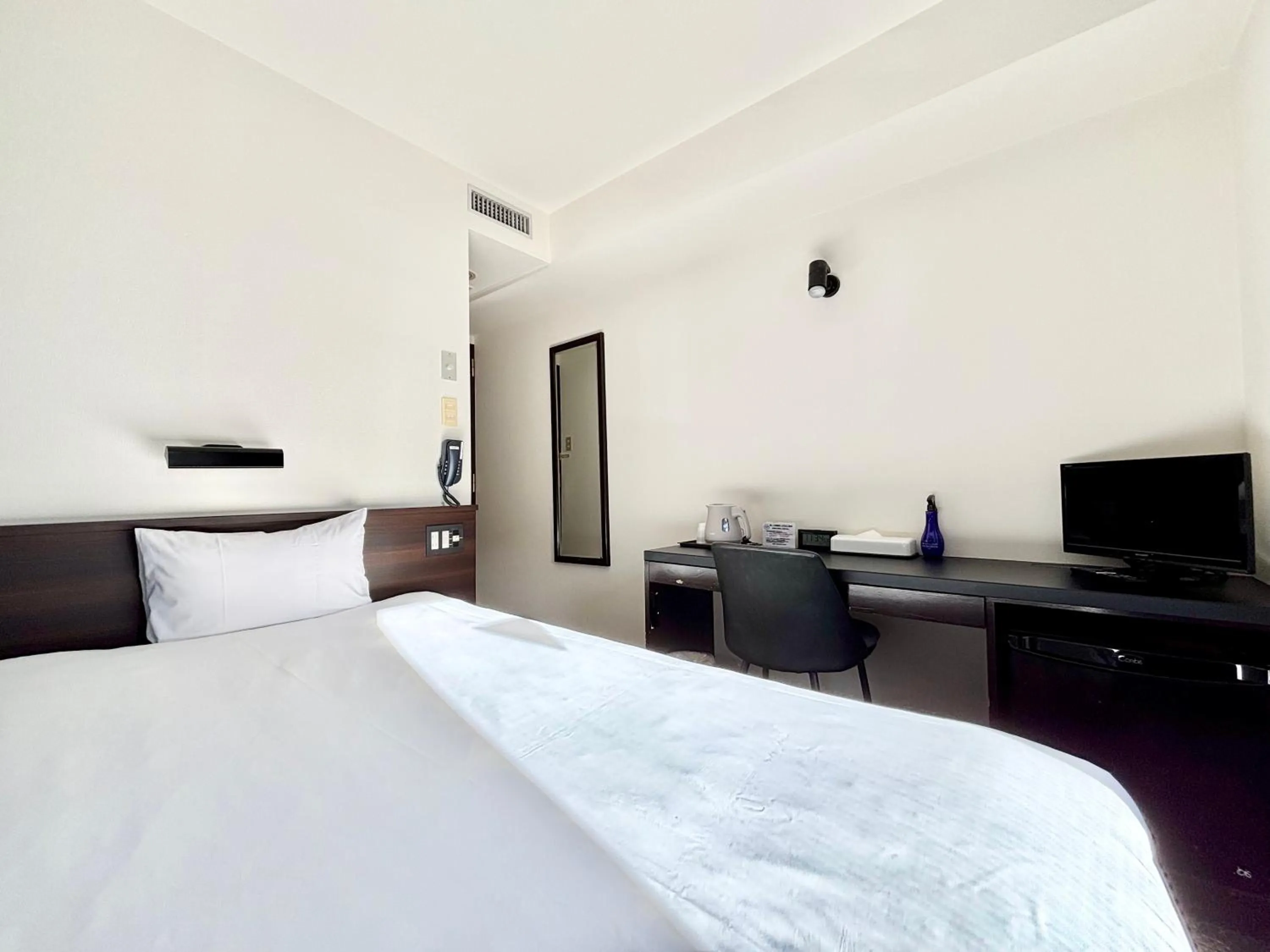 Bed in Hotel Bougain Villea Sapporo