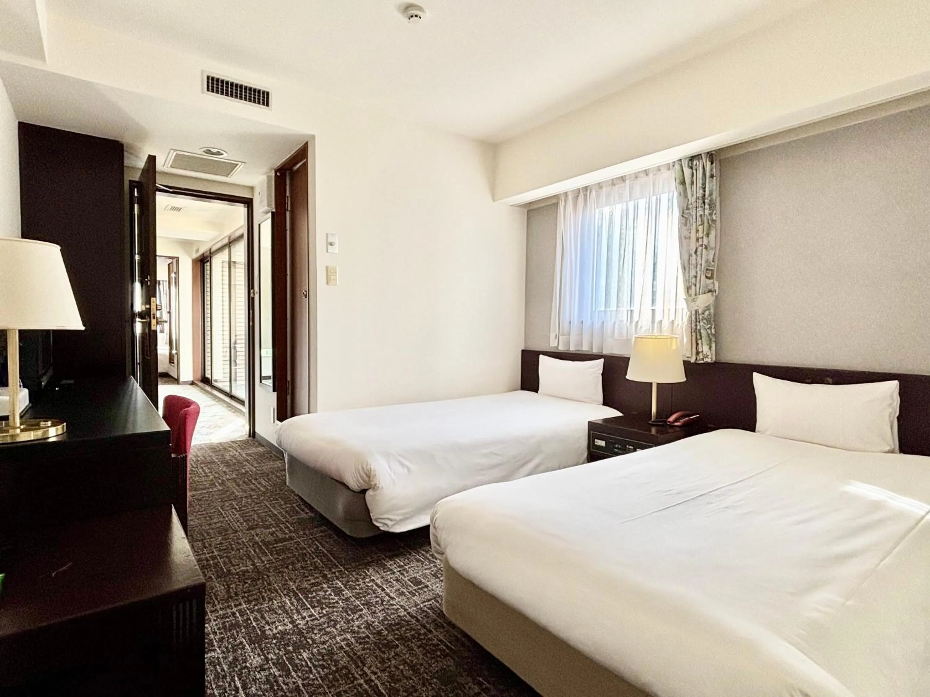 Bed in Hotel Bougain Villea Sapporo