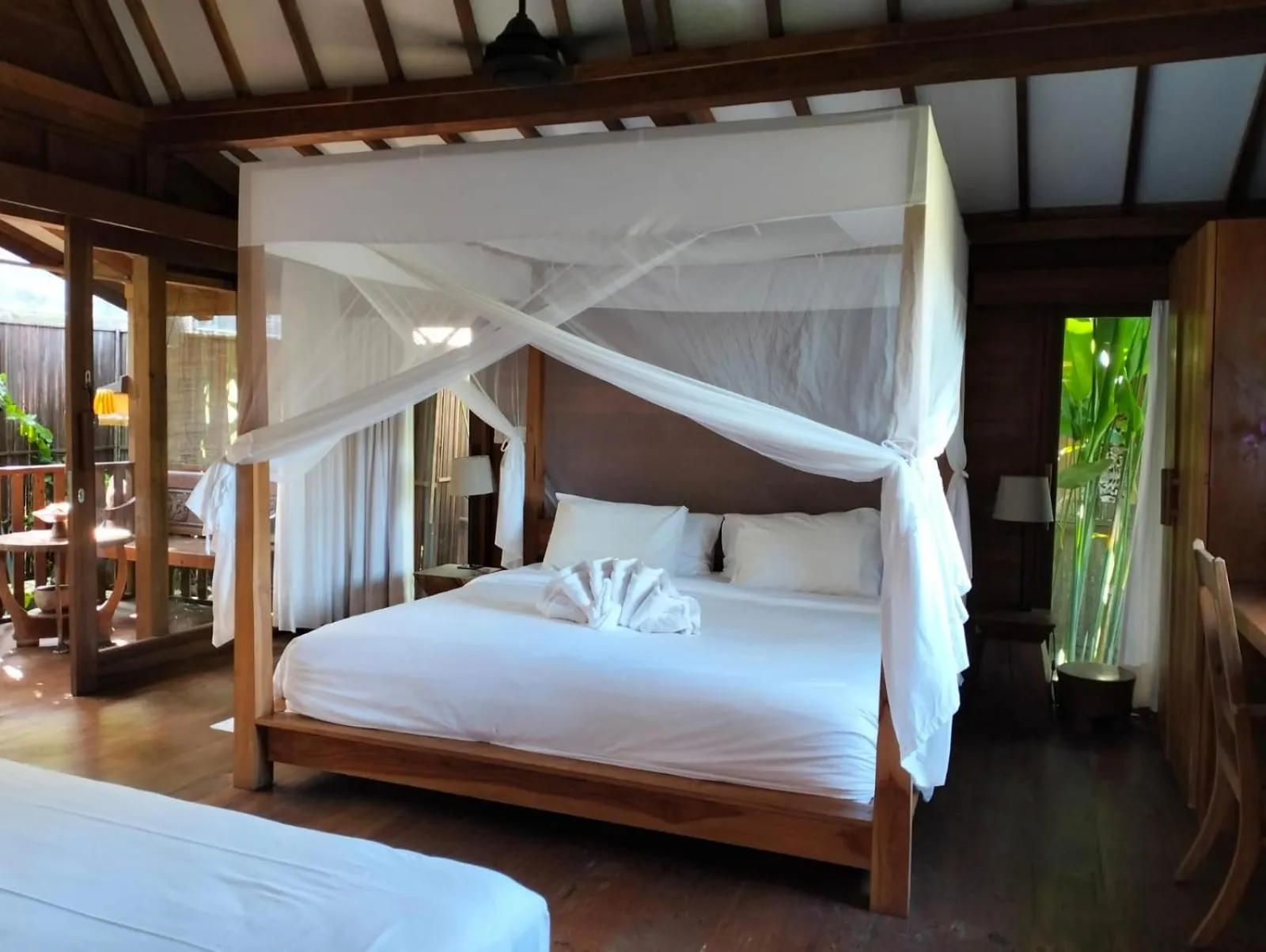 Bed in De Ubud Villas & Spa