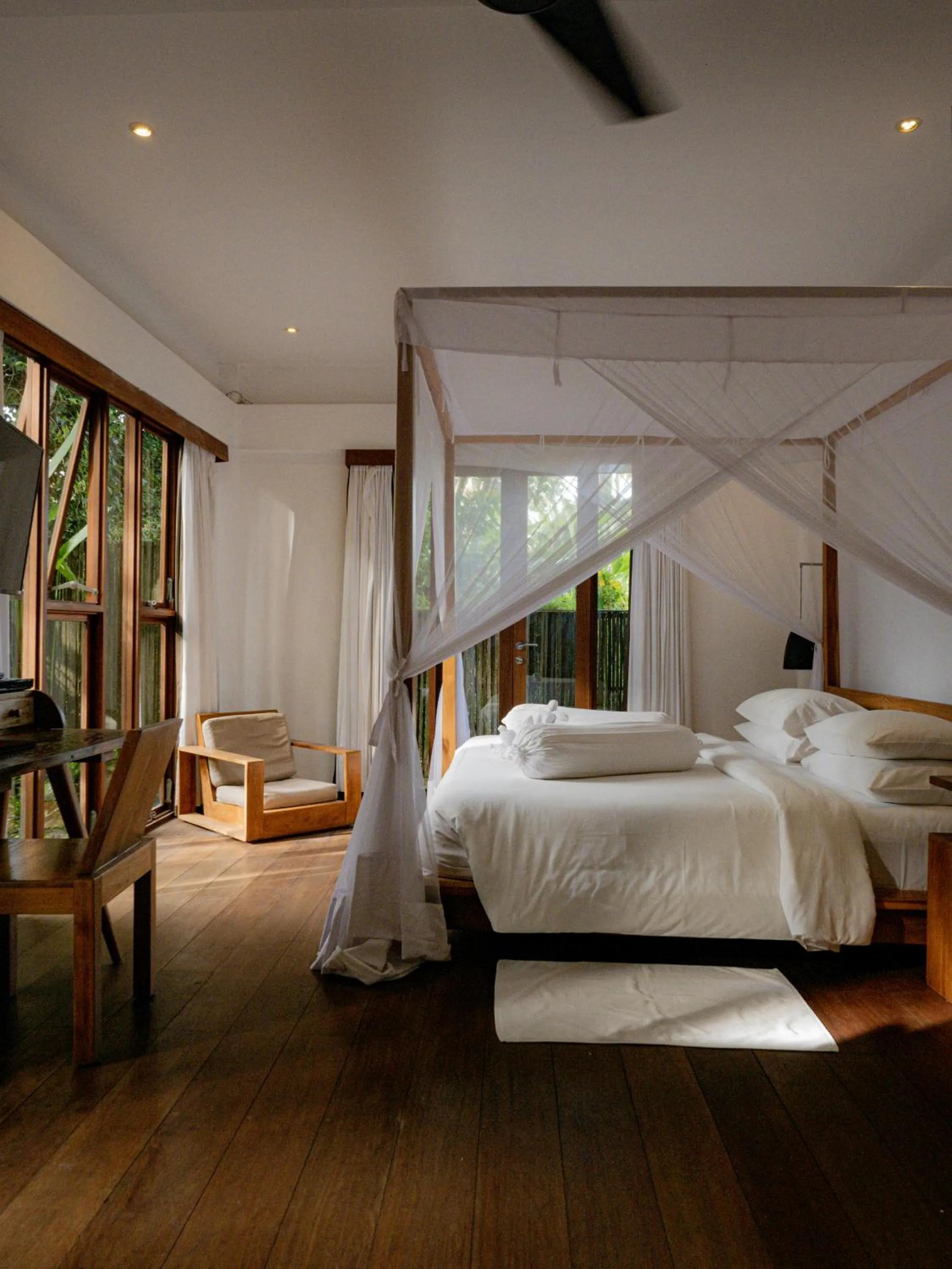 Bed in De Ubud Villas & Spa