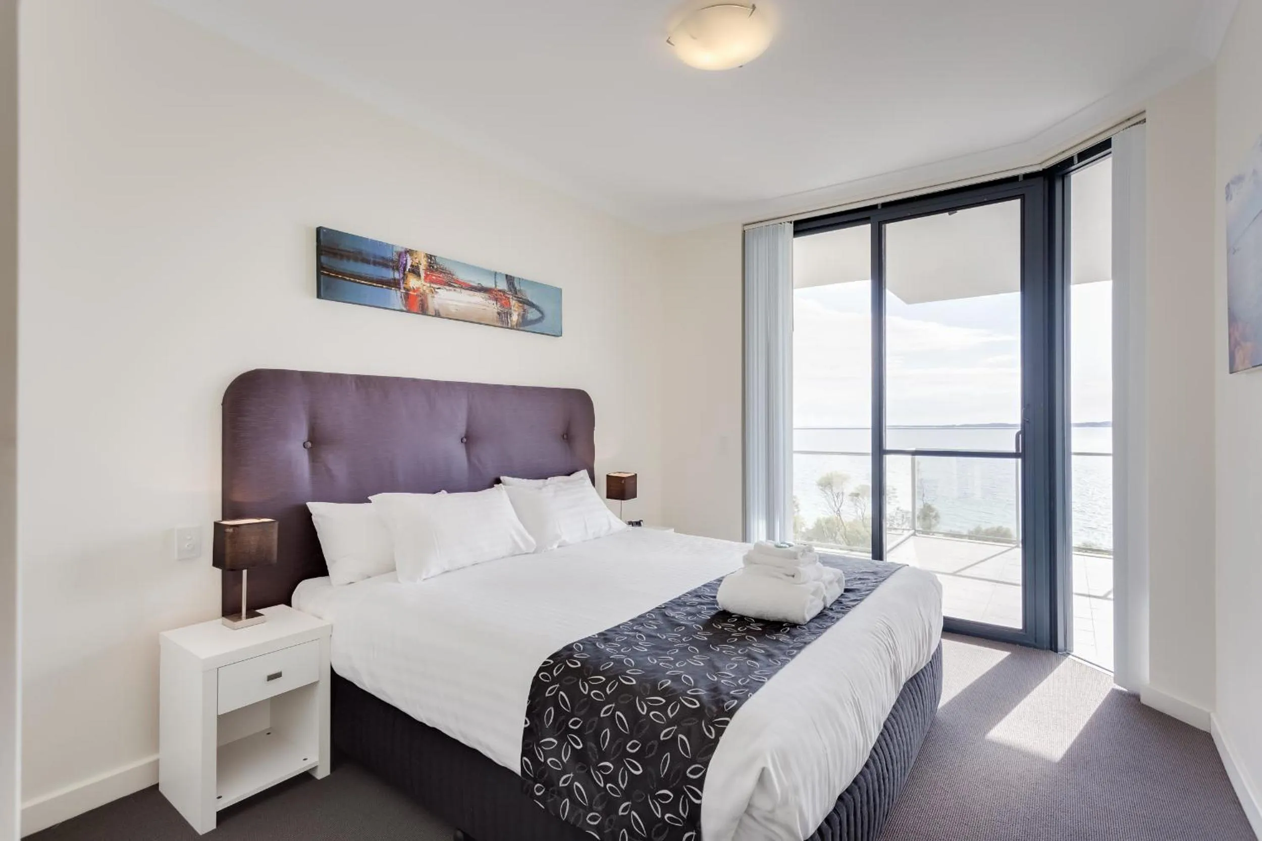 Day, Bed in Nautilus by Rockingham Apartments