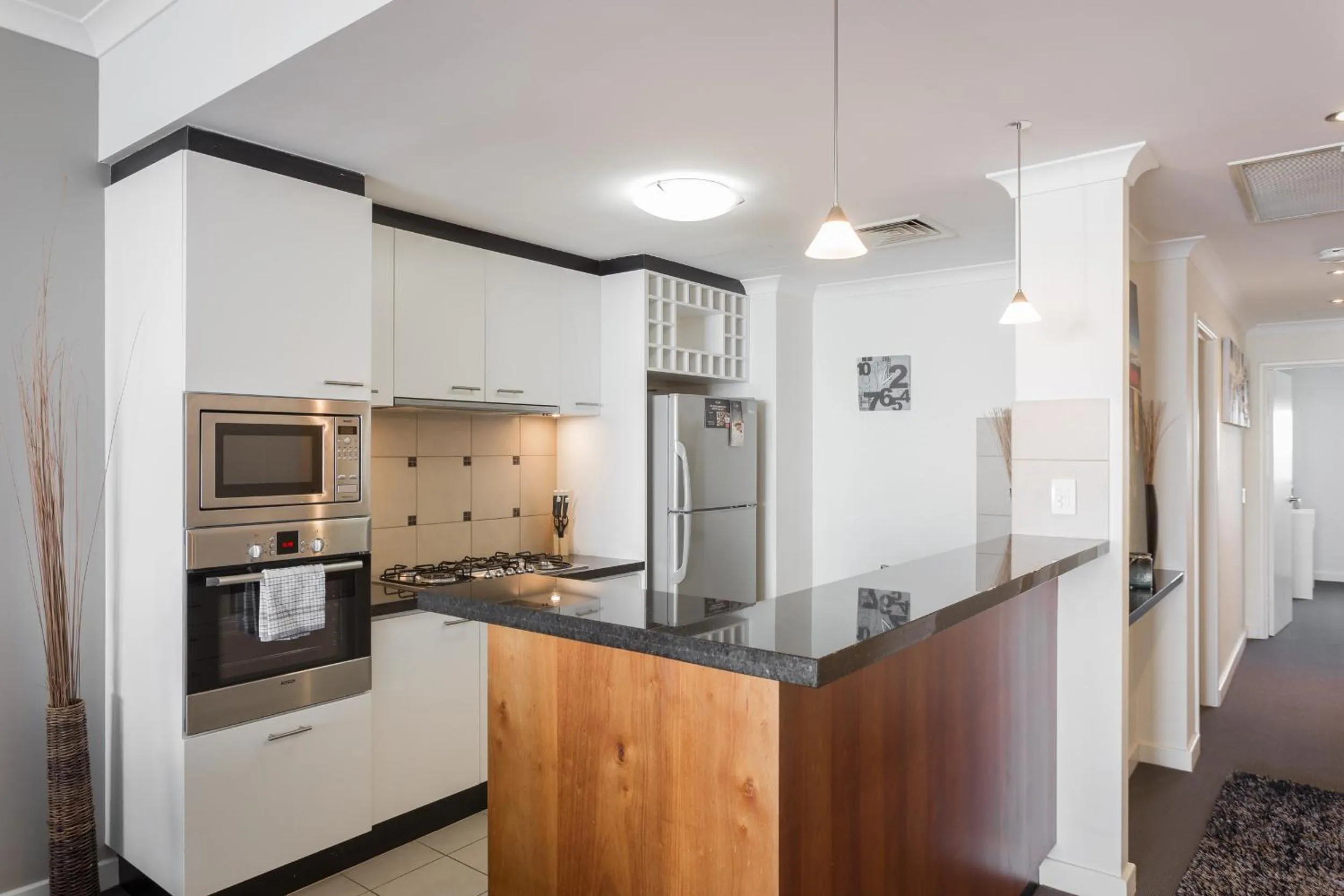 Kitchen or kitchenette in Nautilus by Rockingham Apartments