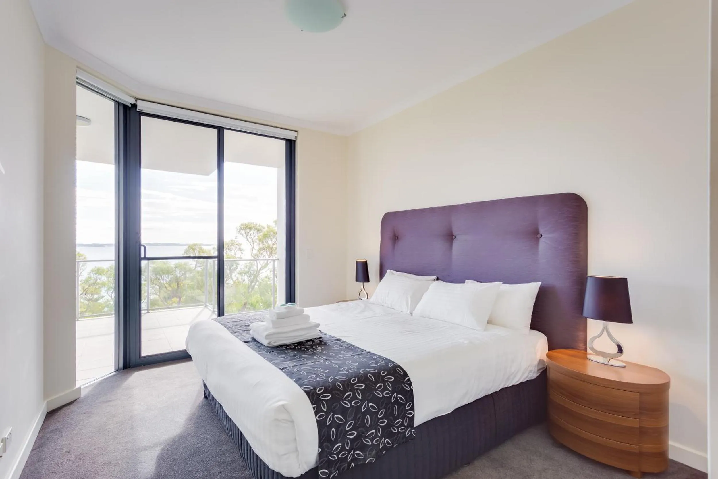 Day, Bed in Nautilus by Rockingham Apartments