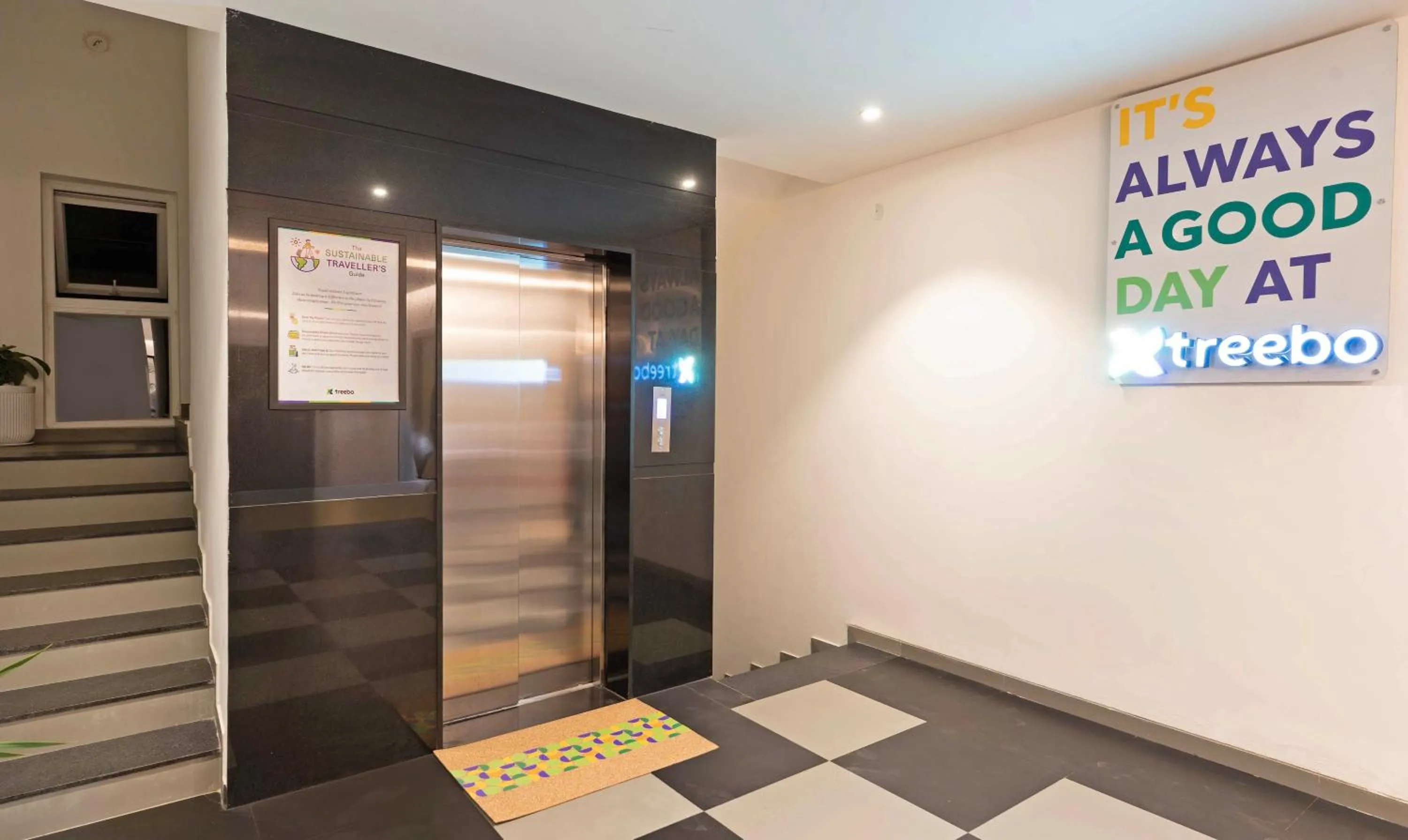 elevator in Treebo Global Orchid