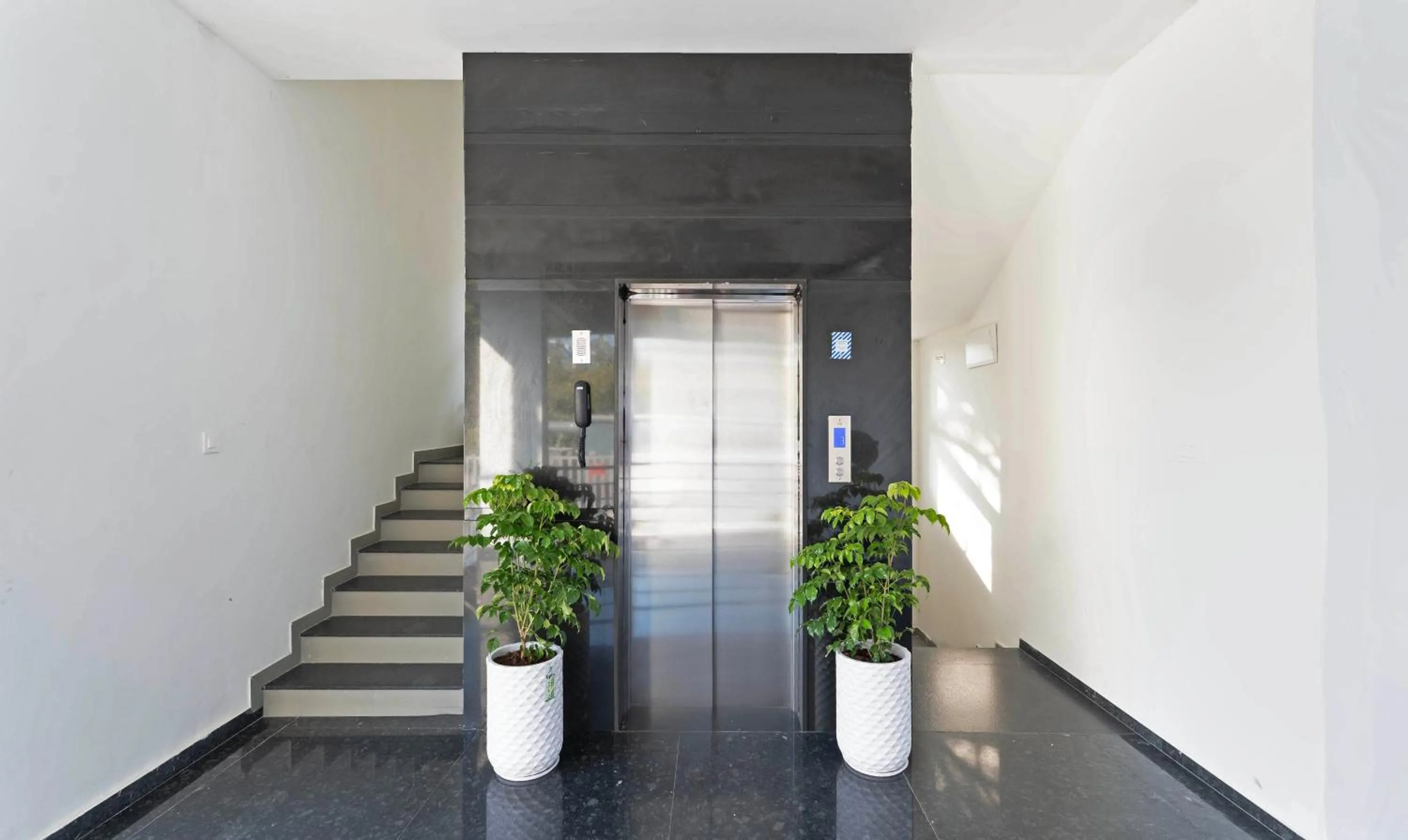 elevator in Treebo Global Orchid