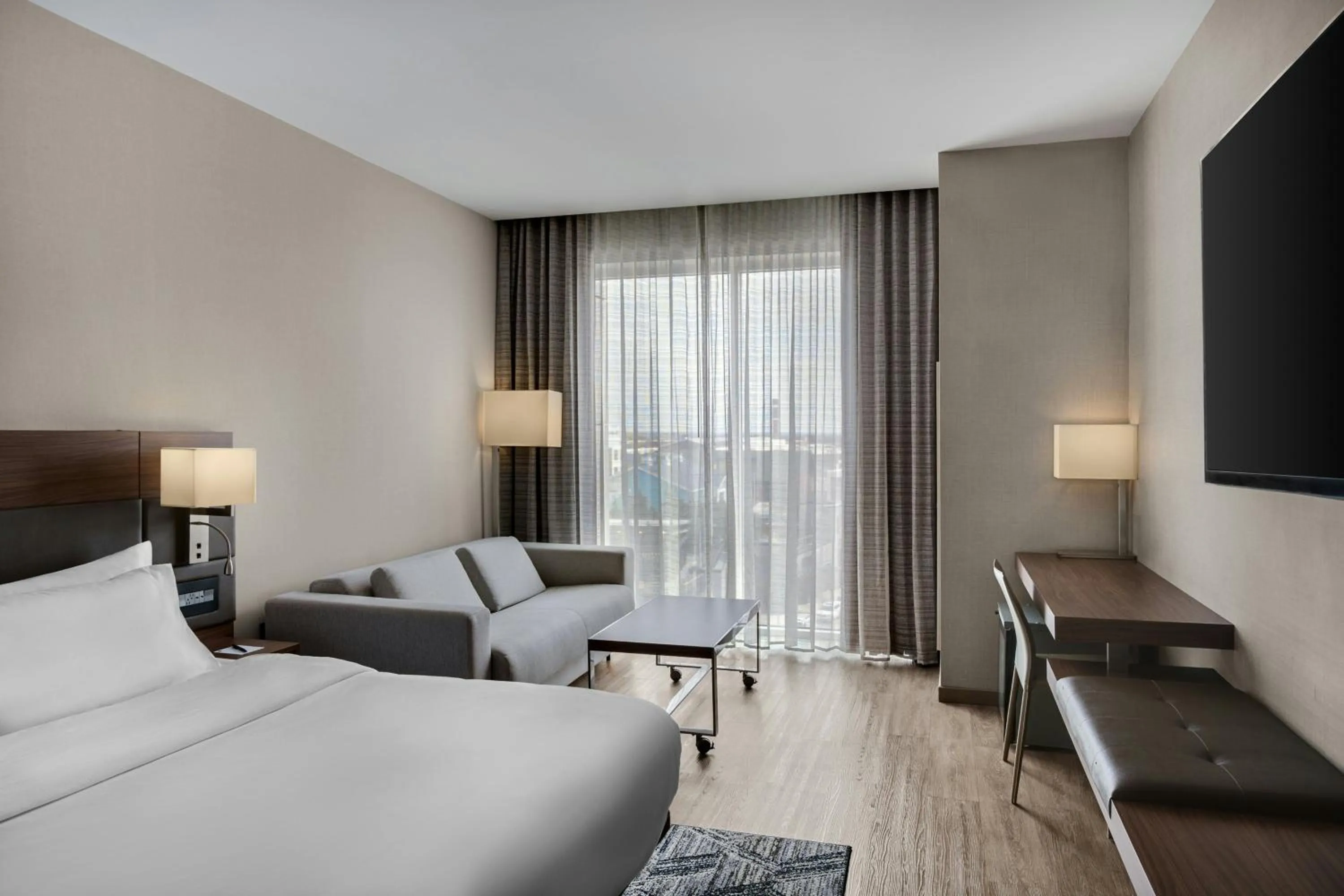 Photo of the whole room, Bed in AC Hotel Cincinnati at Liberty Center