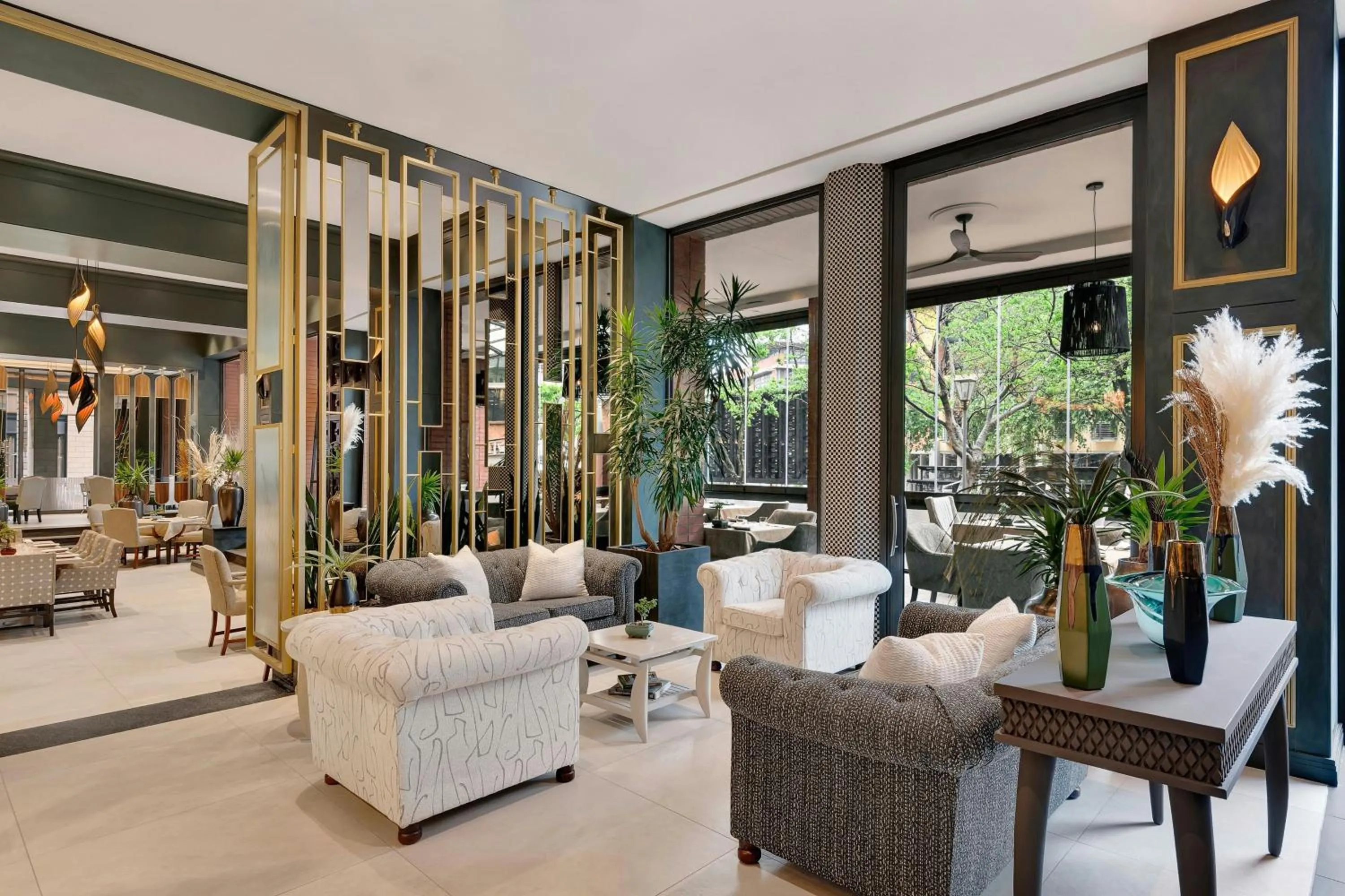 Lounge or bar in African Pride Melrose Arch, Autograph Collection