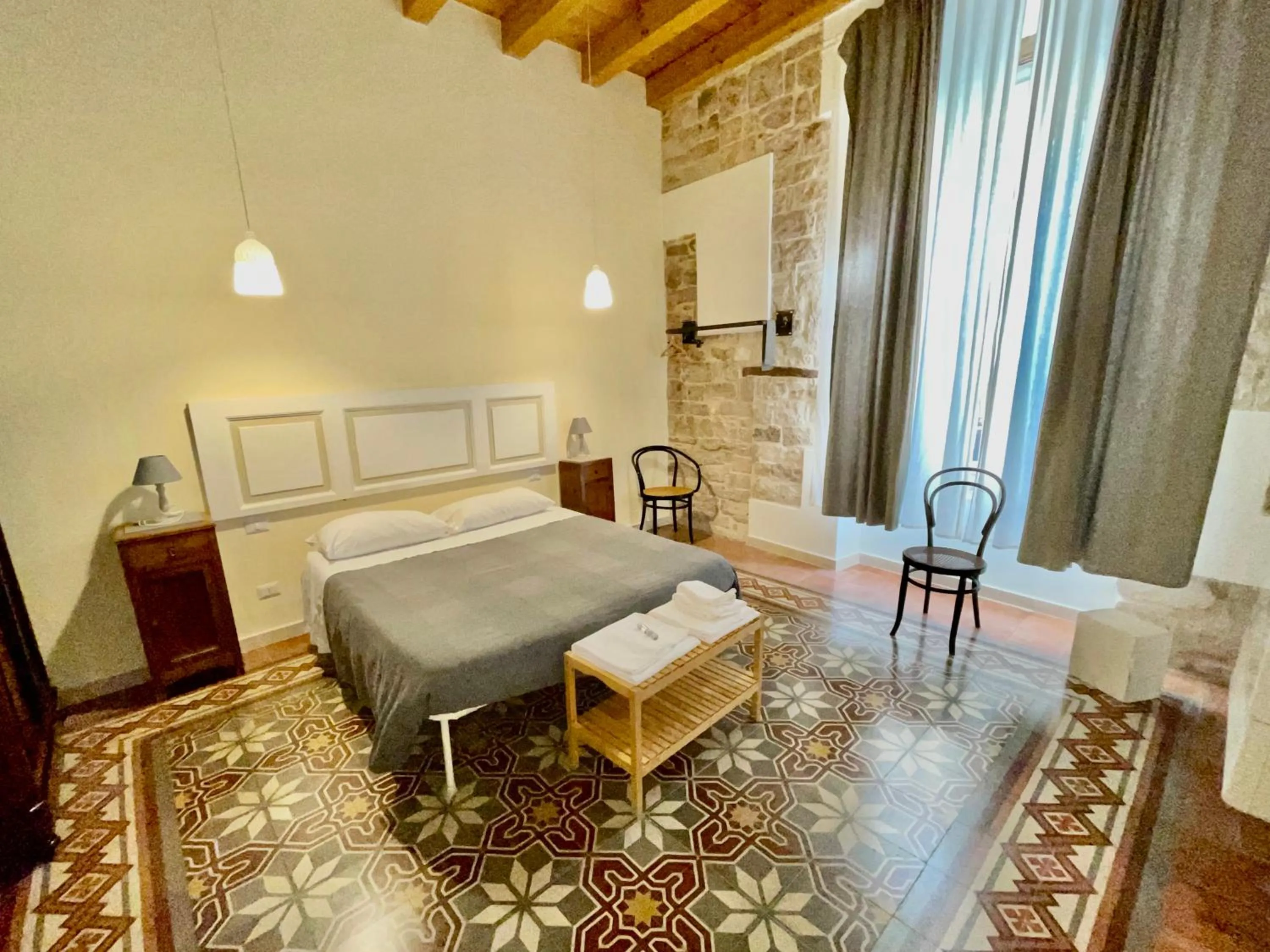 Bed in Palazzo Lupicini Affittacamere
