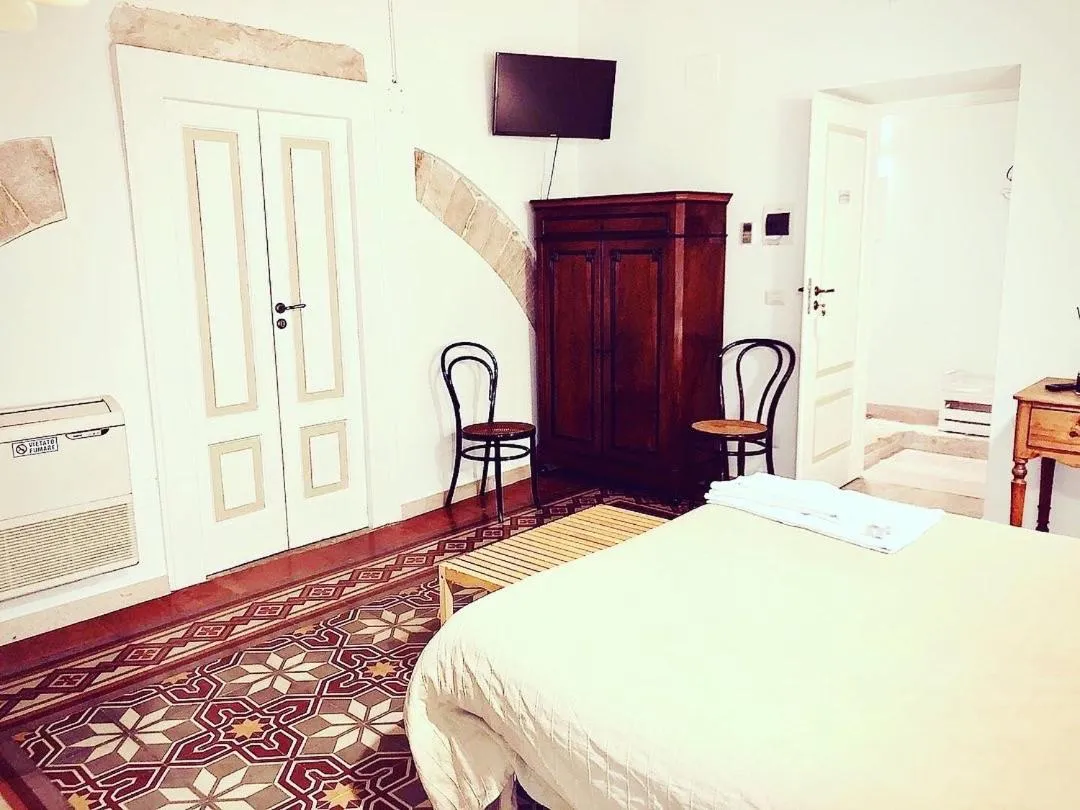 Bed in Palazzo Lupicini Affittacamere