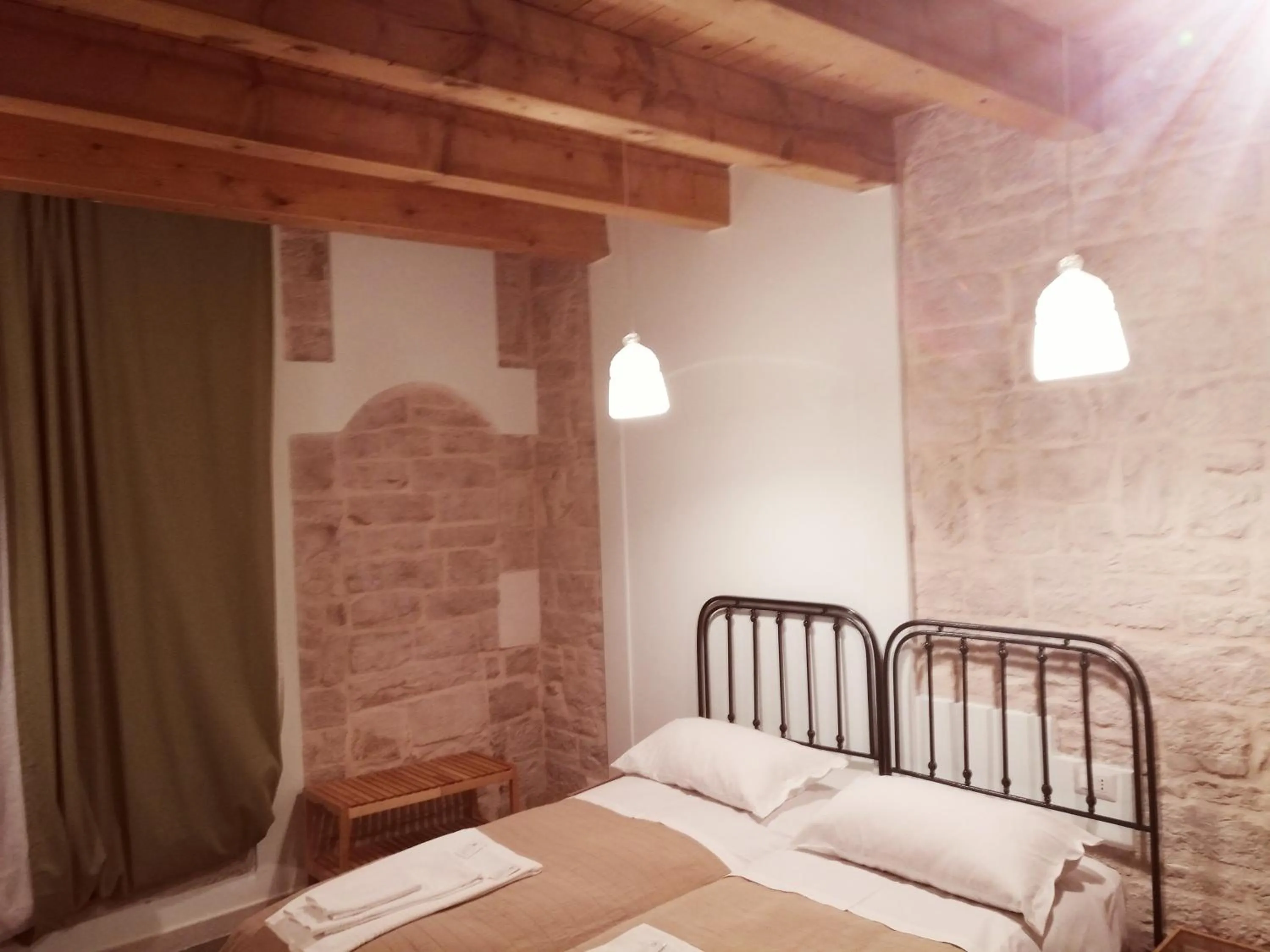 Bed in Palazzo Lupicini Affittacamere