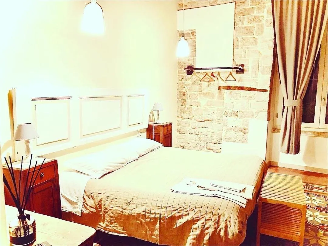 Bed in Palazzo Lupicini Affittacamere