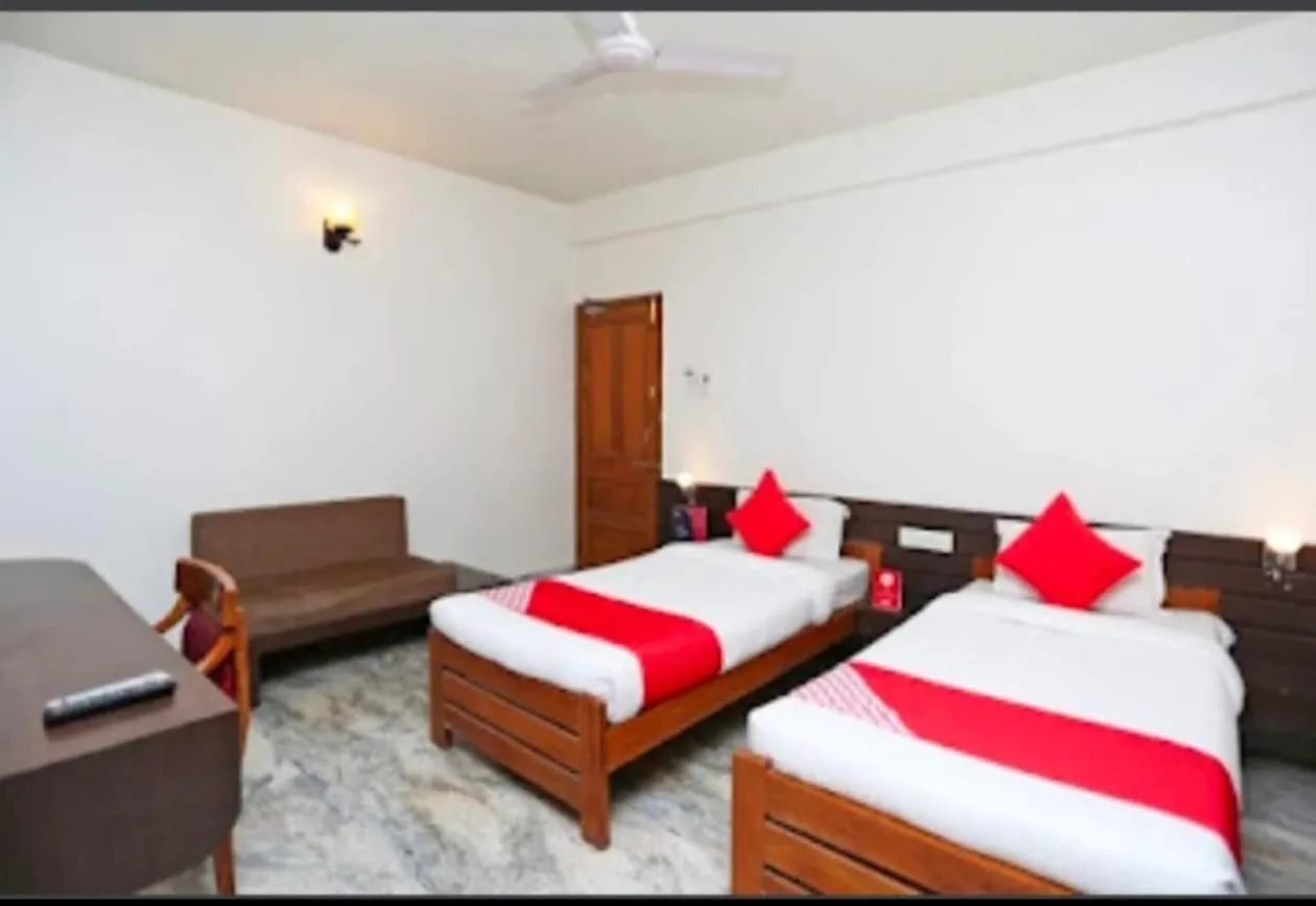 Bed in Hotel Vijay Palace