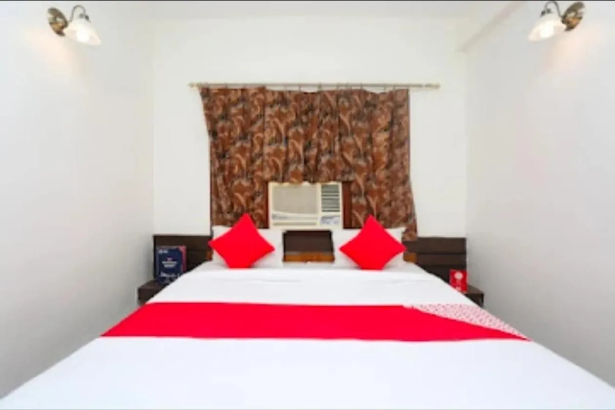 Bed in Hotel Vijay Palace
