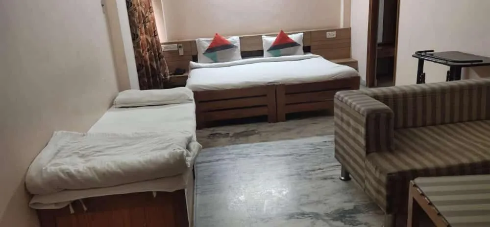 Bed in Hotel Vijay Palace